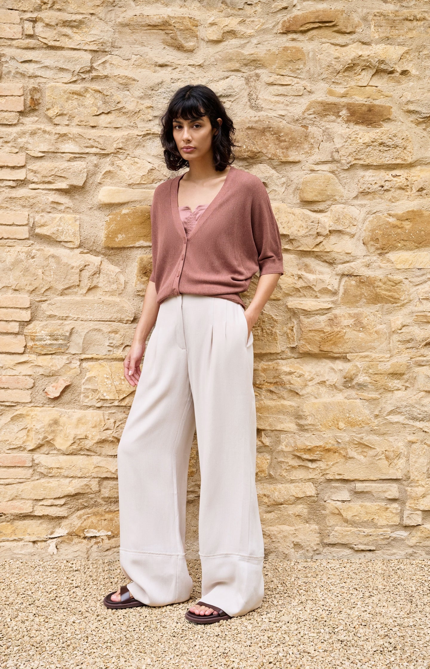 Linen blend trousers with wide legs and fringed details