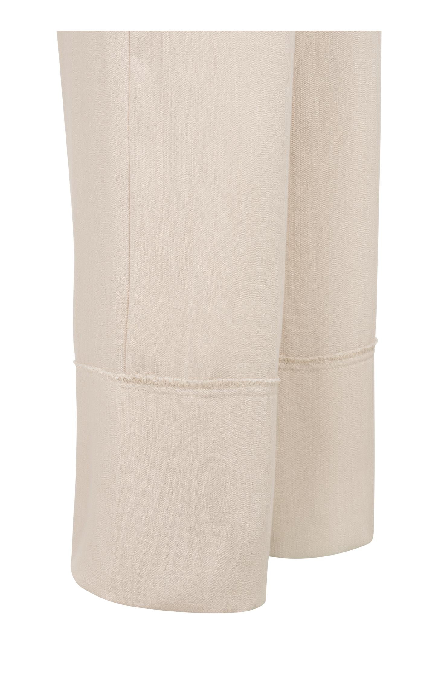 Linen blend trousers with wide legs and fringed details