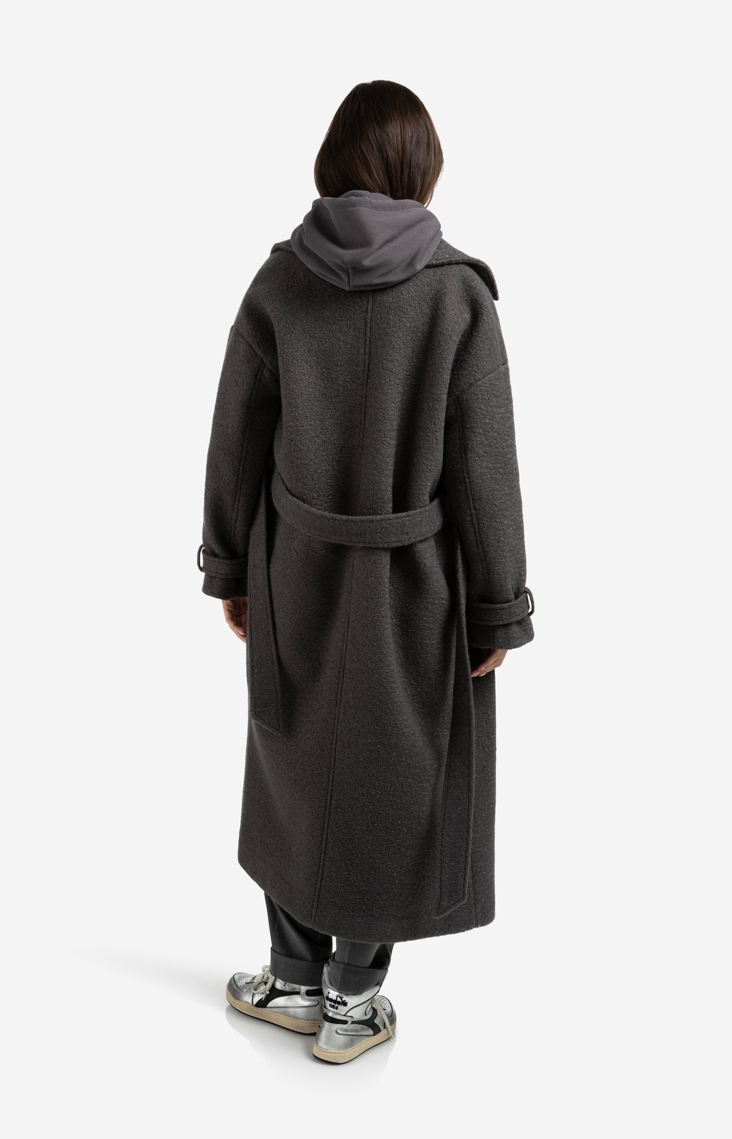 Long bouclé coat with belt and oversized fit