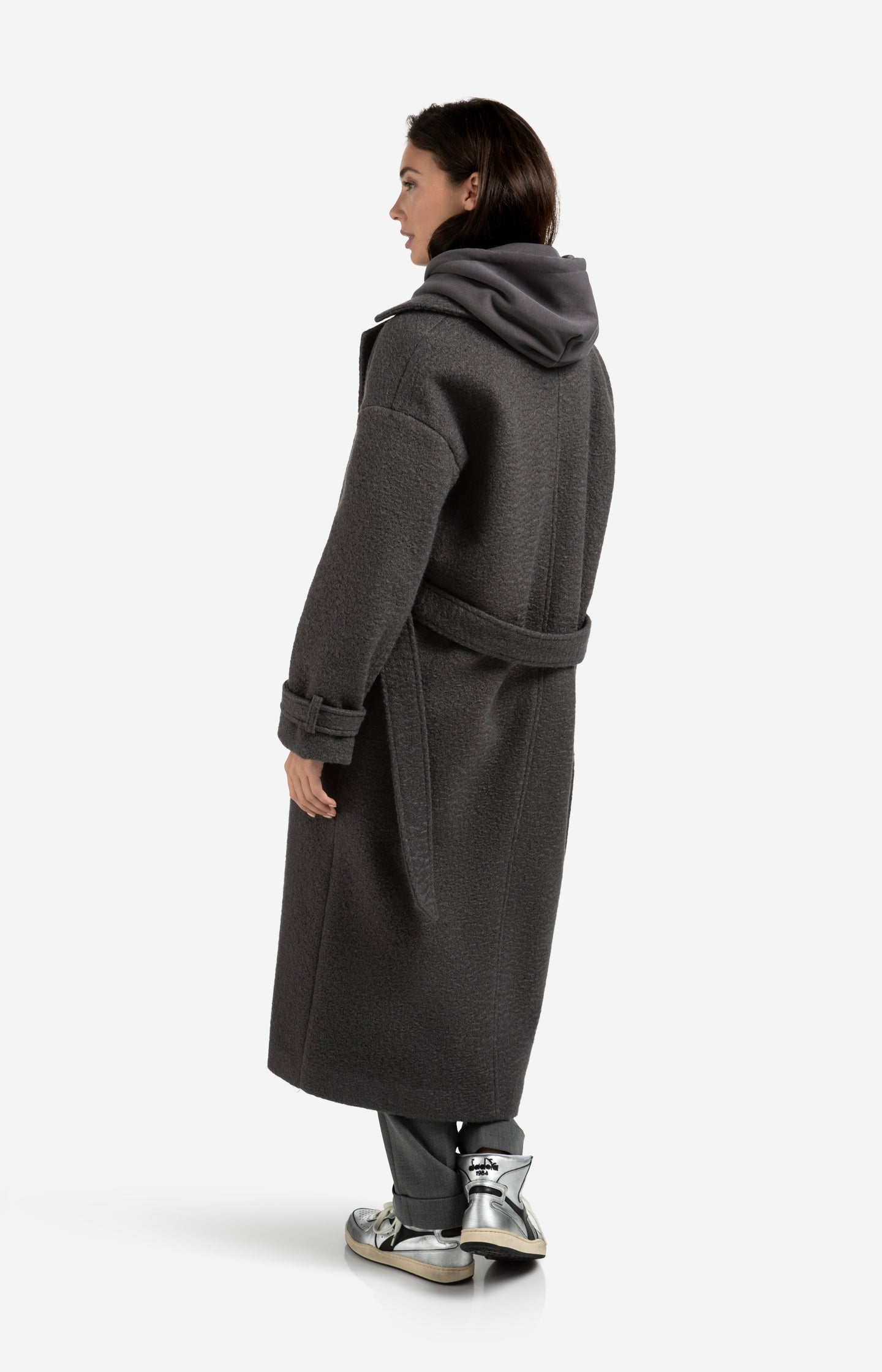 Long bouclé coat with belt and oversized fit