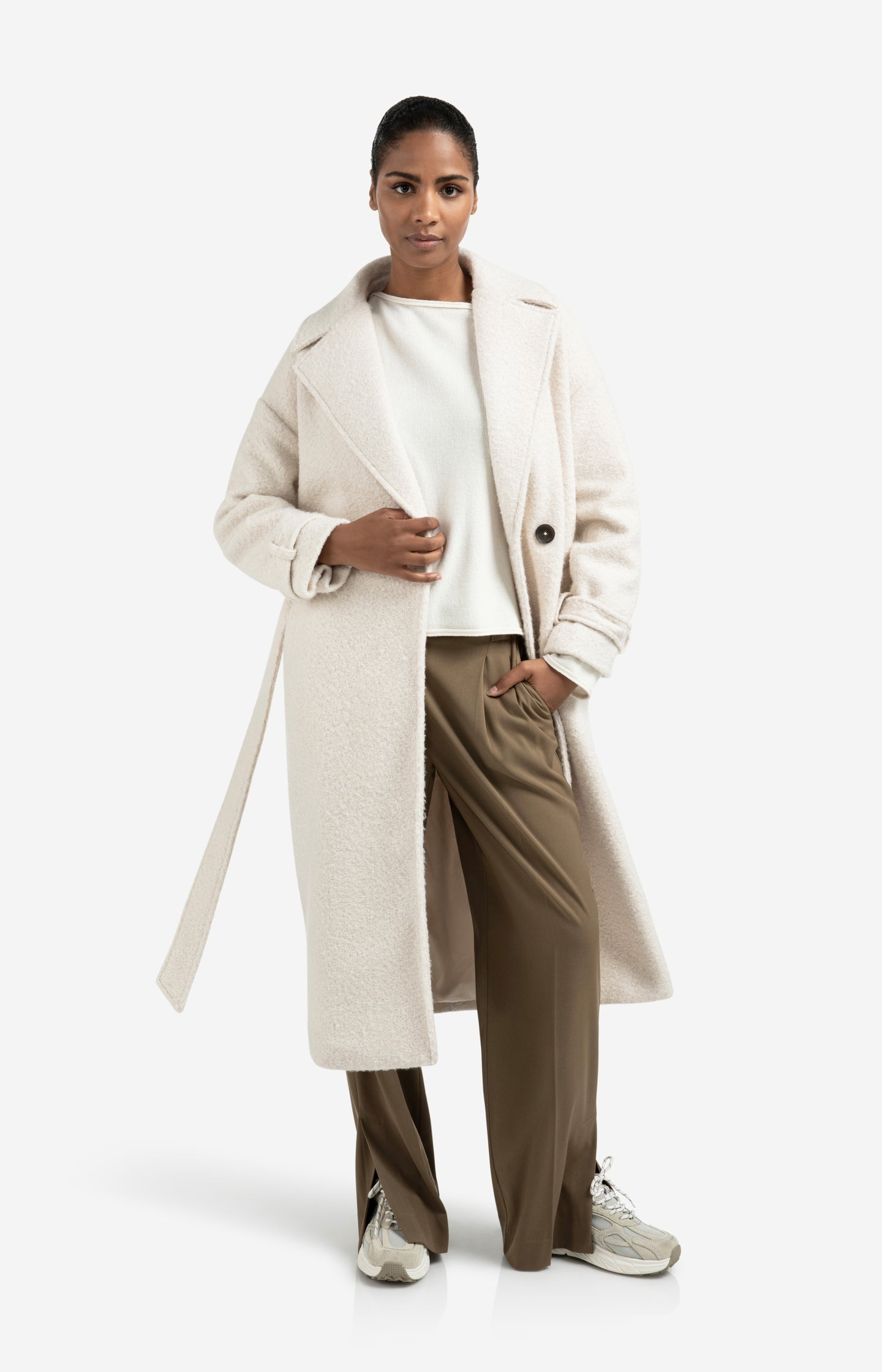 Long bouclé coat with belt and oversized fit