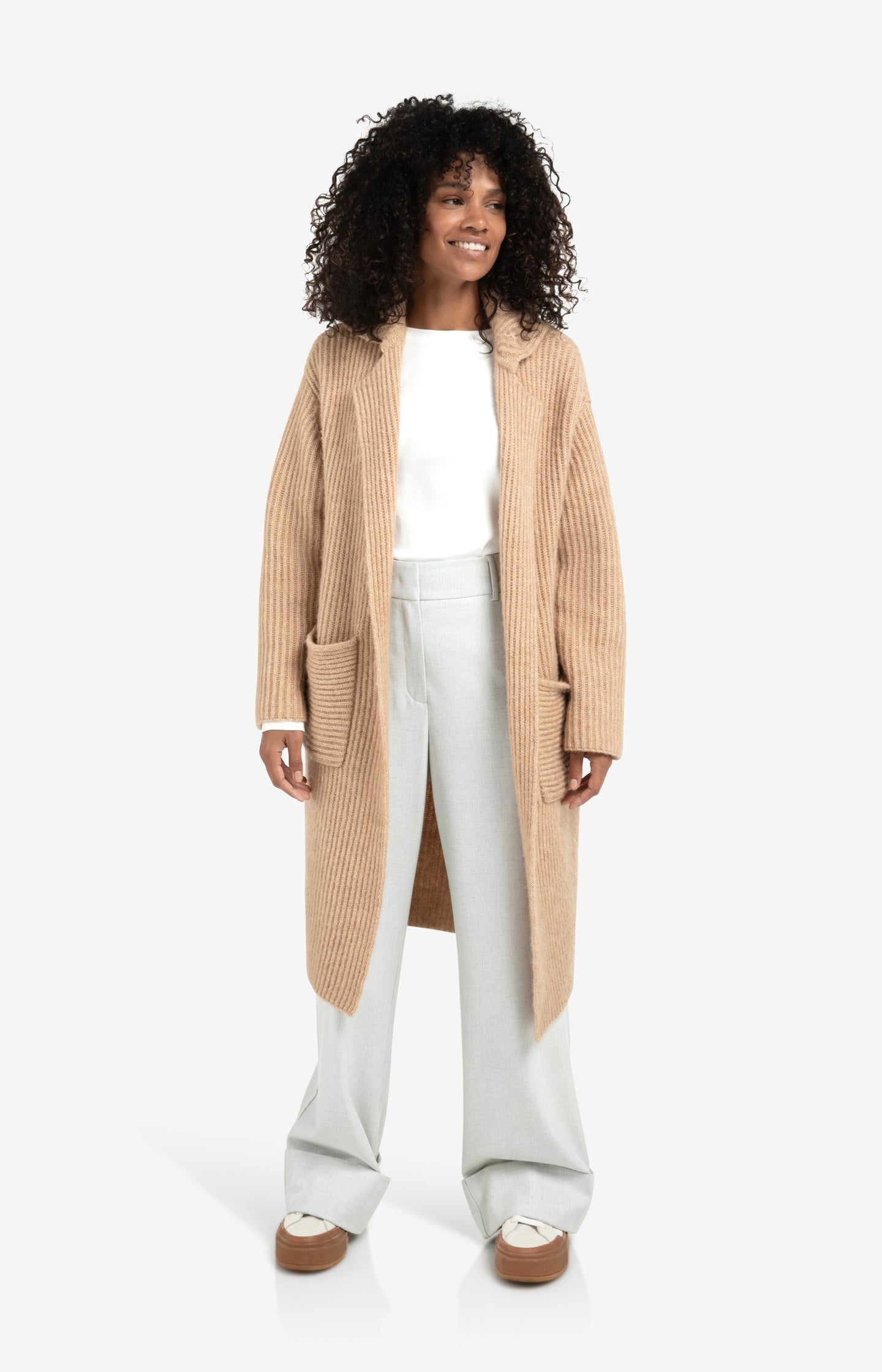 Long heavy knit cardigan with collar and patch pockets