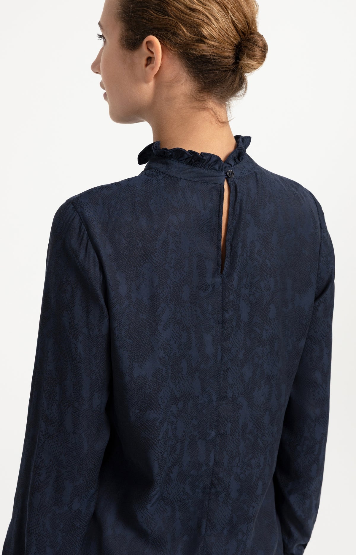 Long sleeve top with ruffle details