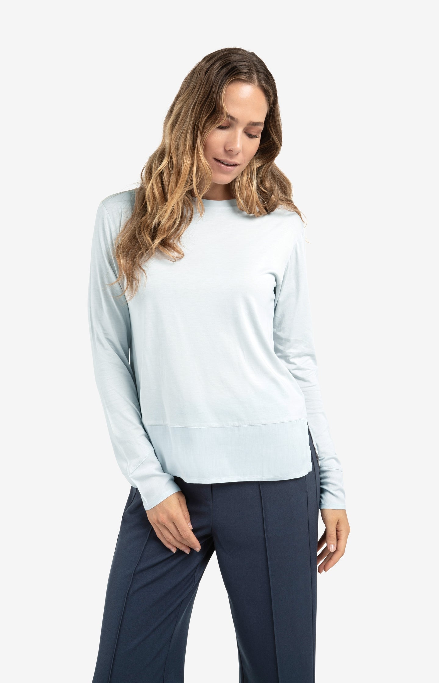 Long sleeve top with woven hem and cuff details
