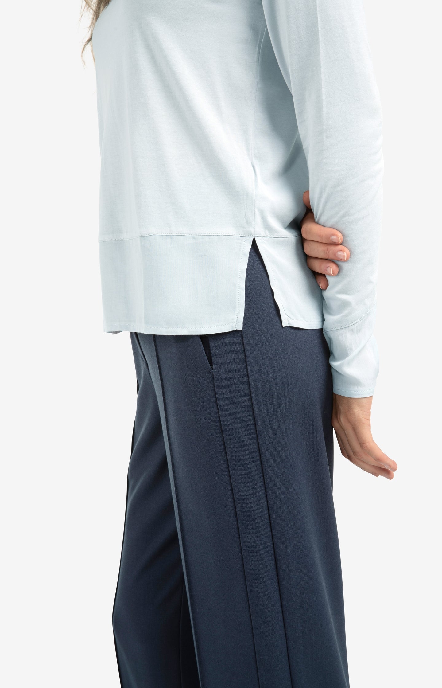 Long sleeve top with woven hem and cuff details
