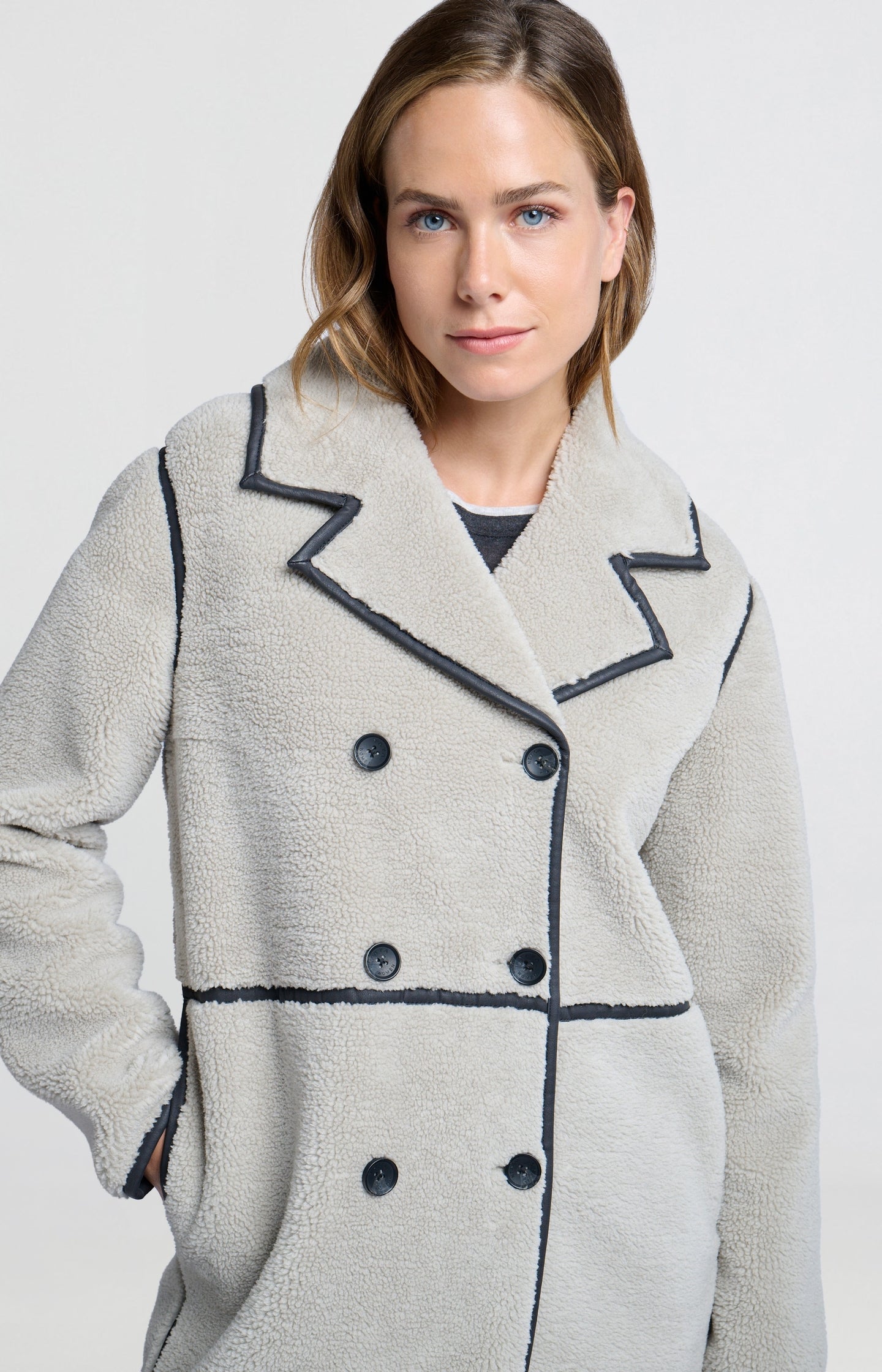 Long teddy coat with double-breasted buttons and collar