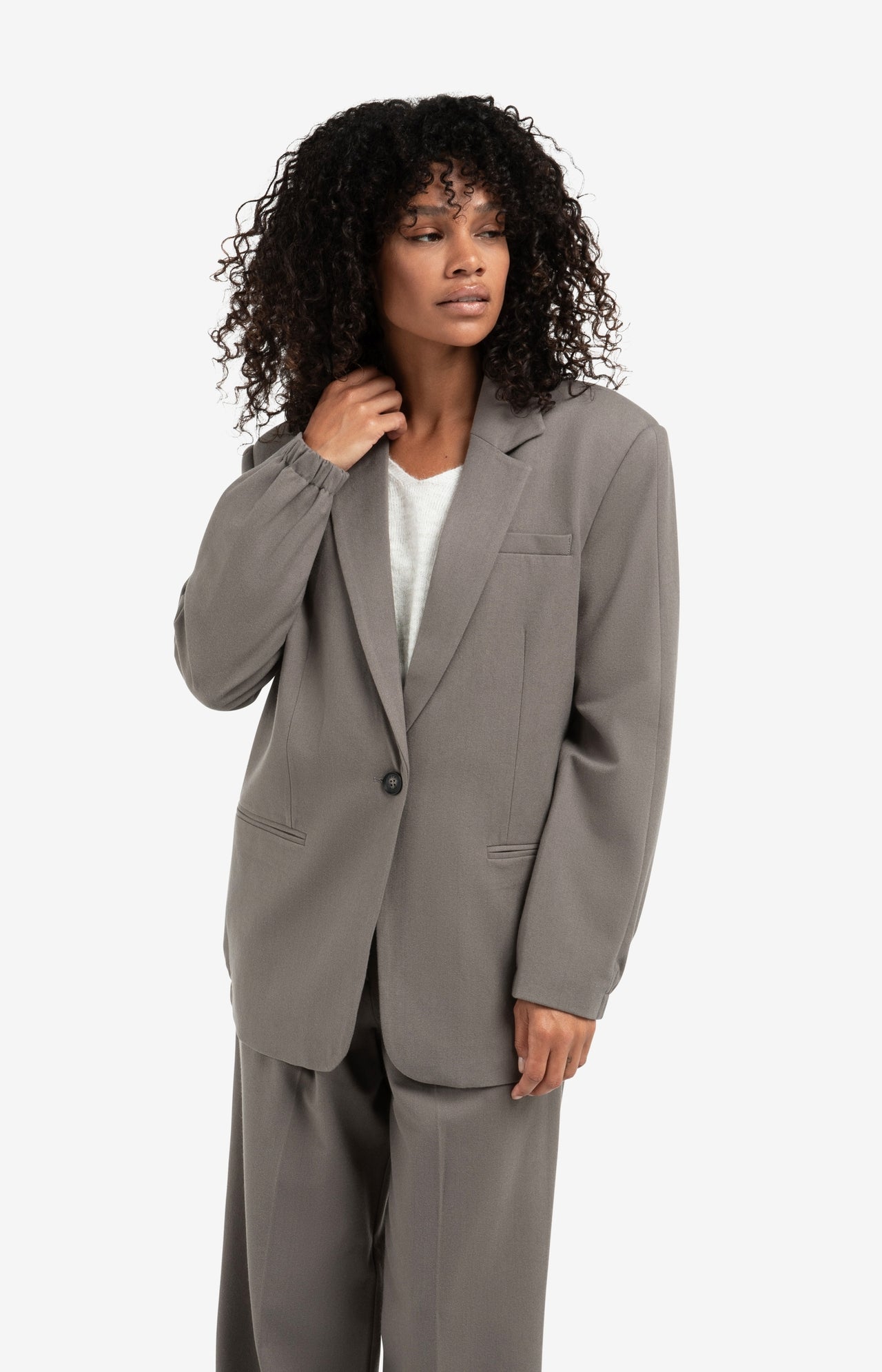 Loose-fit blazer with elastic hem and long sleeves