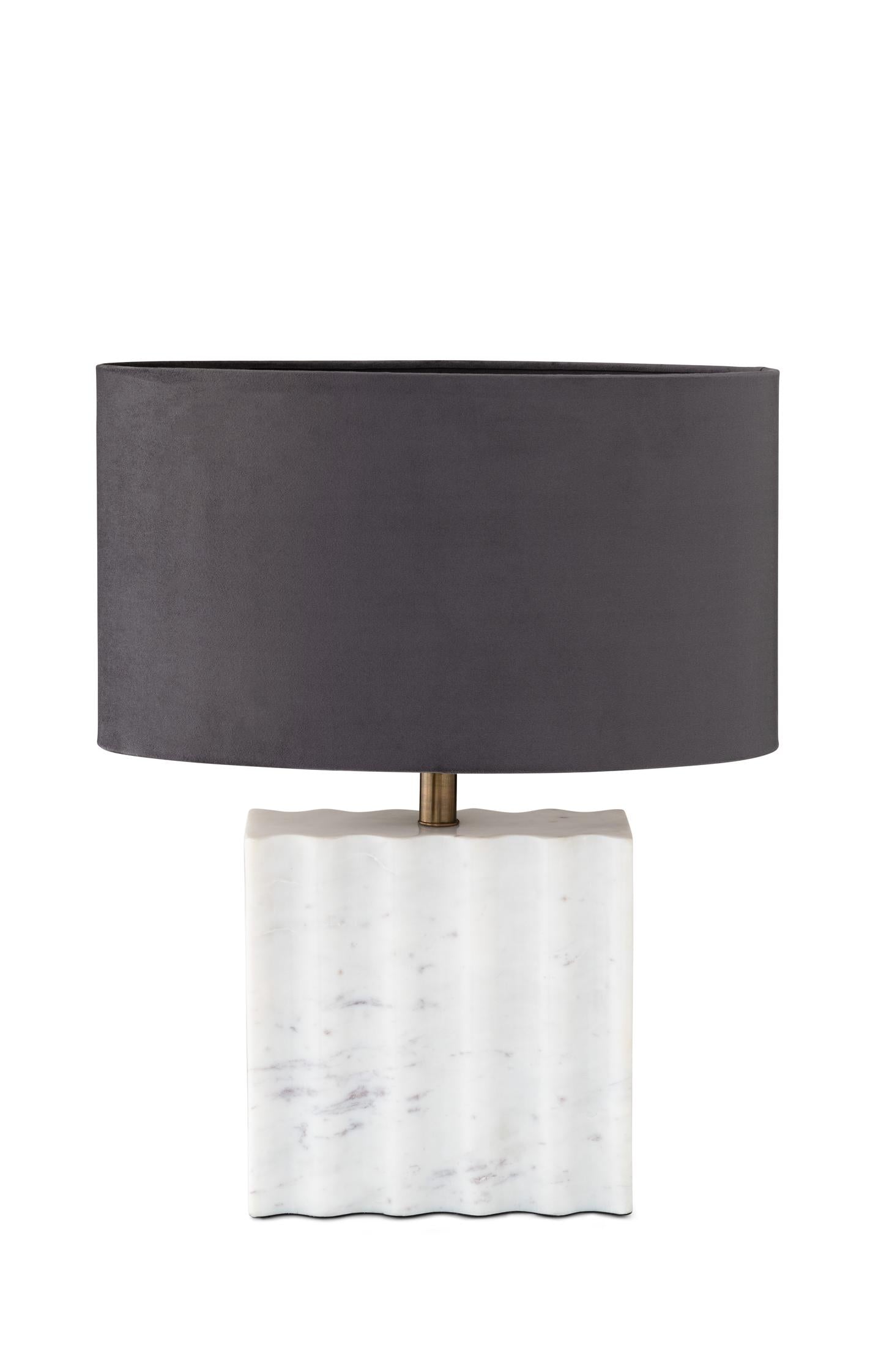 Marble lamp base with wavy relief 