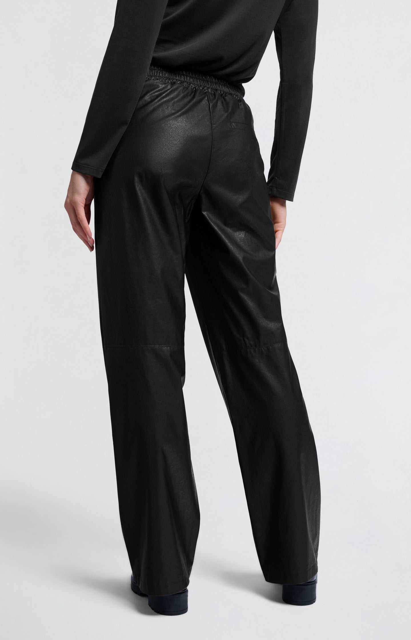 Metallic faux leather pants with wide legs and regular fit