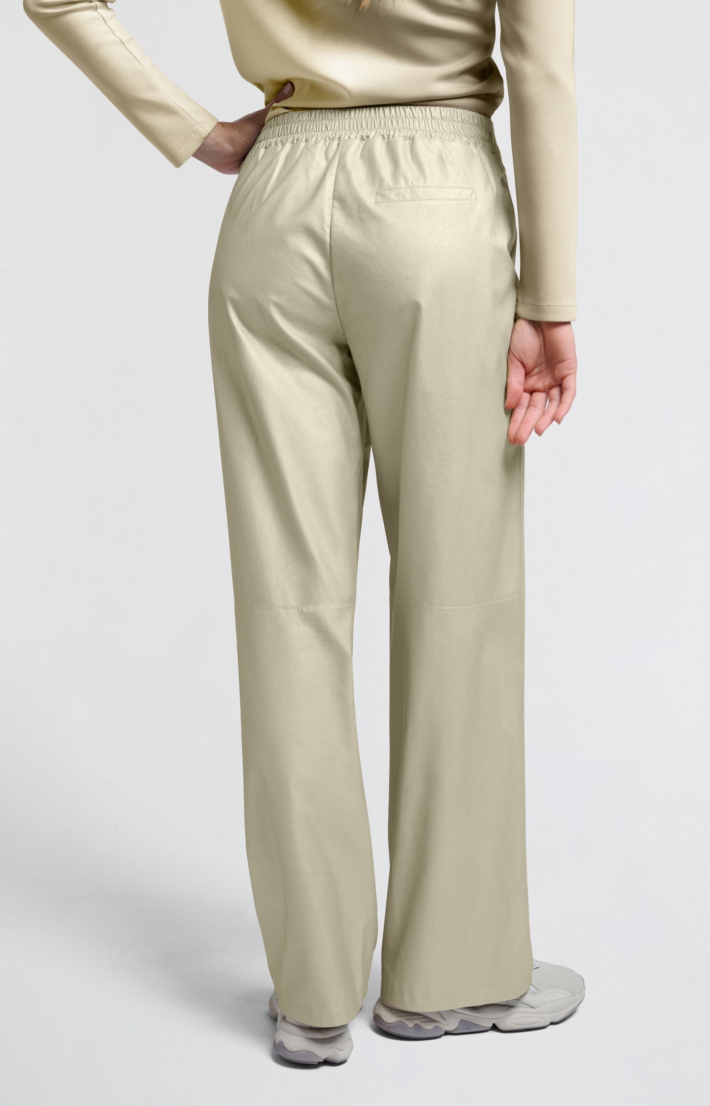 Metallic faux leather pants with wide legs and regular fit