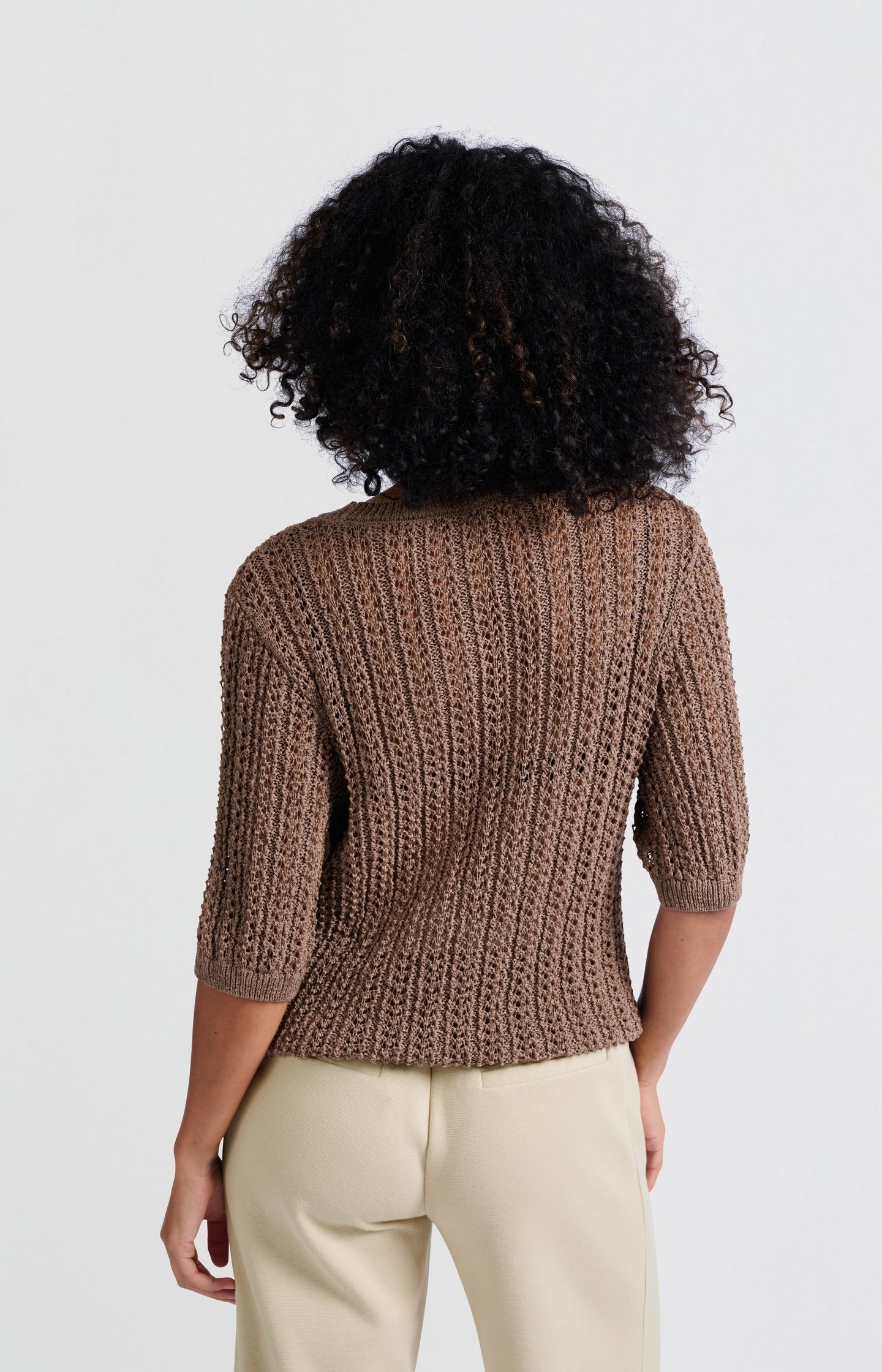 Open-knit sweater with half-length sleeves