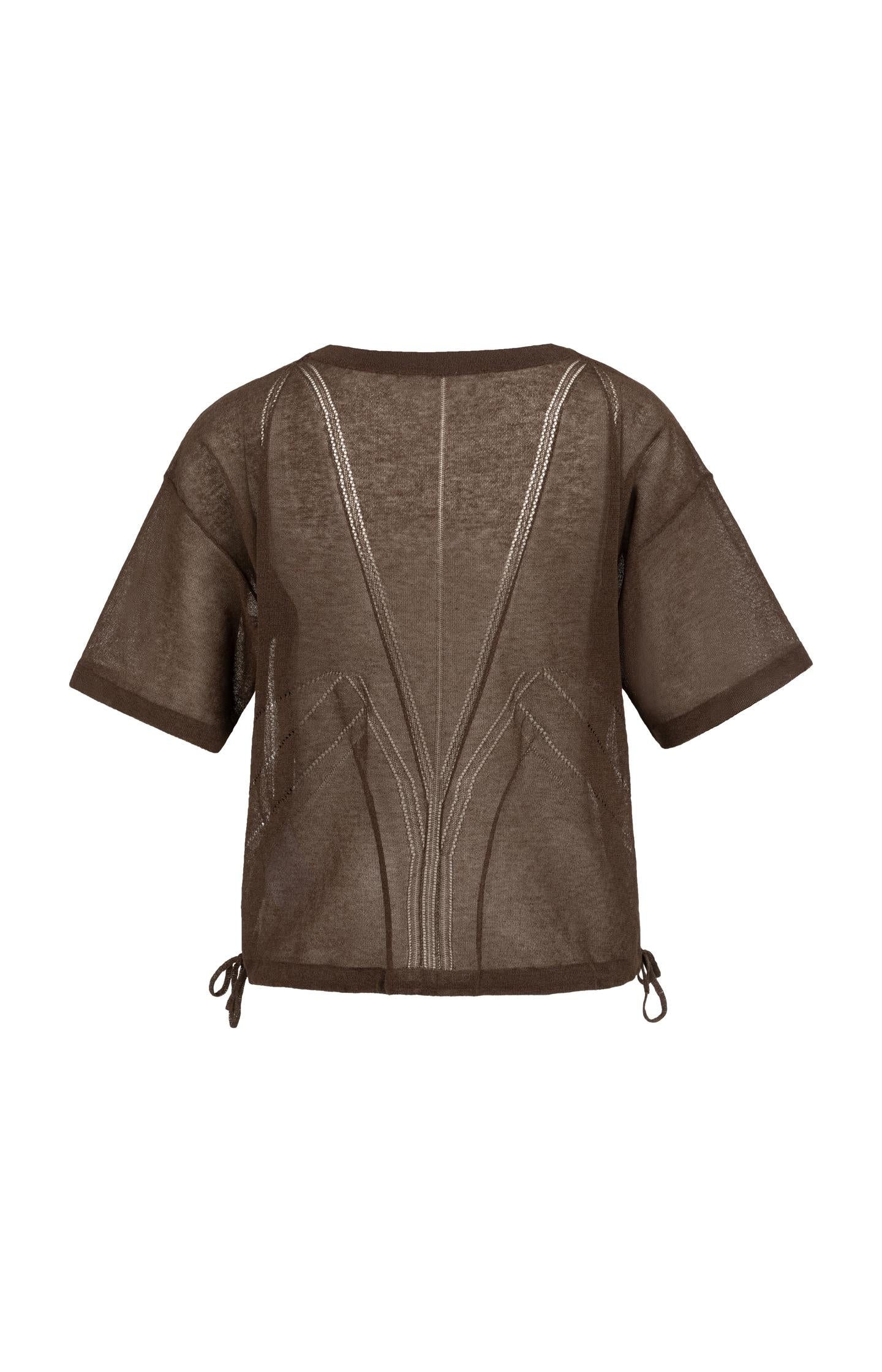 Open-knit top with ajour pattern and tie details