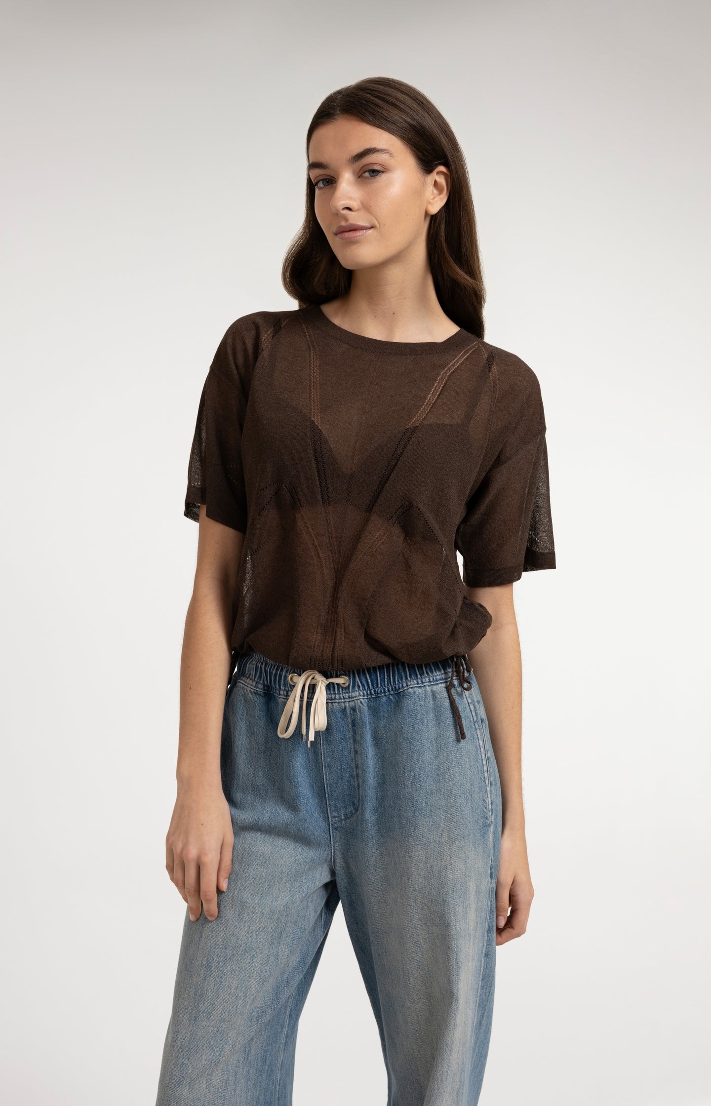 Open-knit top with ajour pattern and tie details