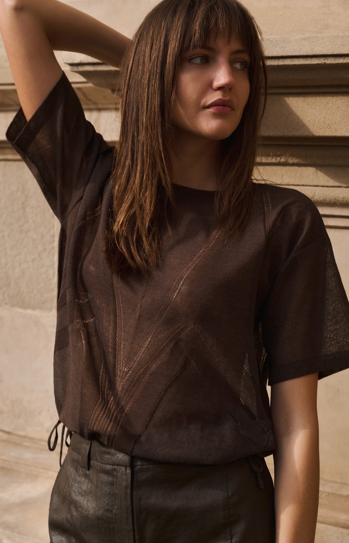 Open-knit top with ajour pattern and tie details