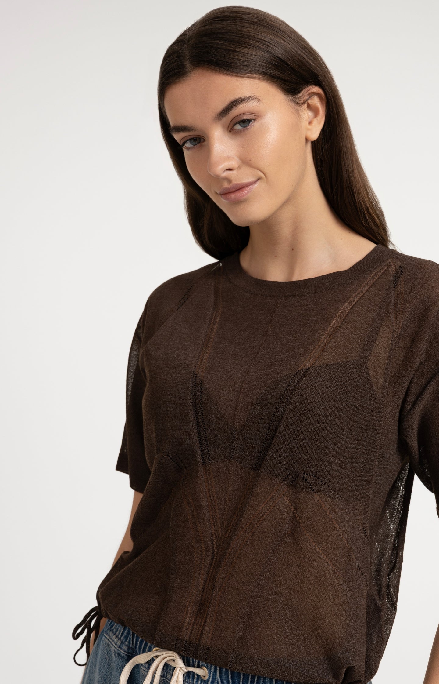 Open-knit top with ajour pattern and tie details