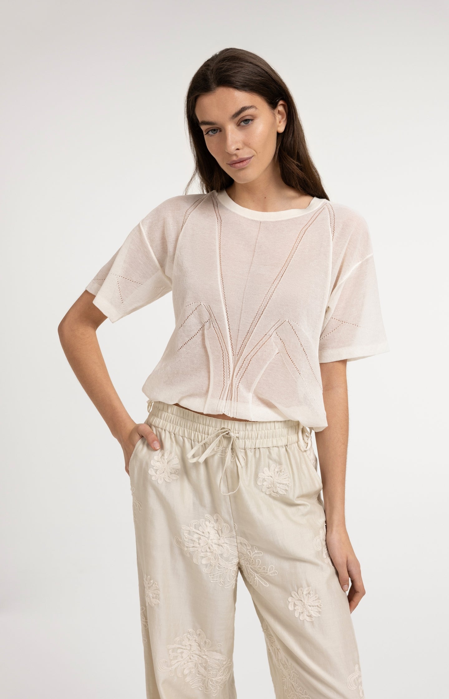 Open-knit top with ajour pattern and tie details