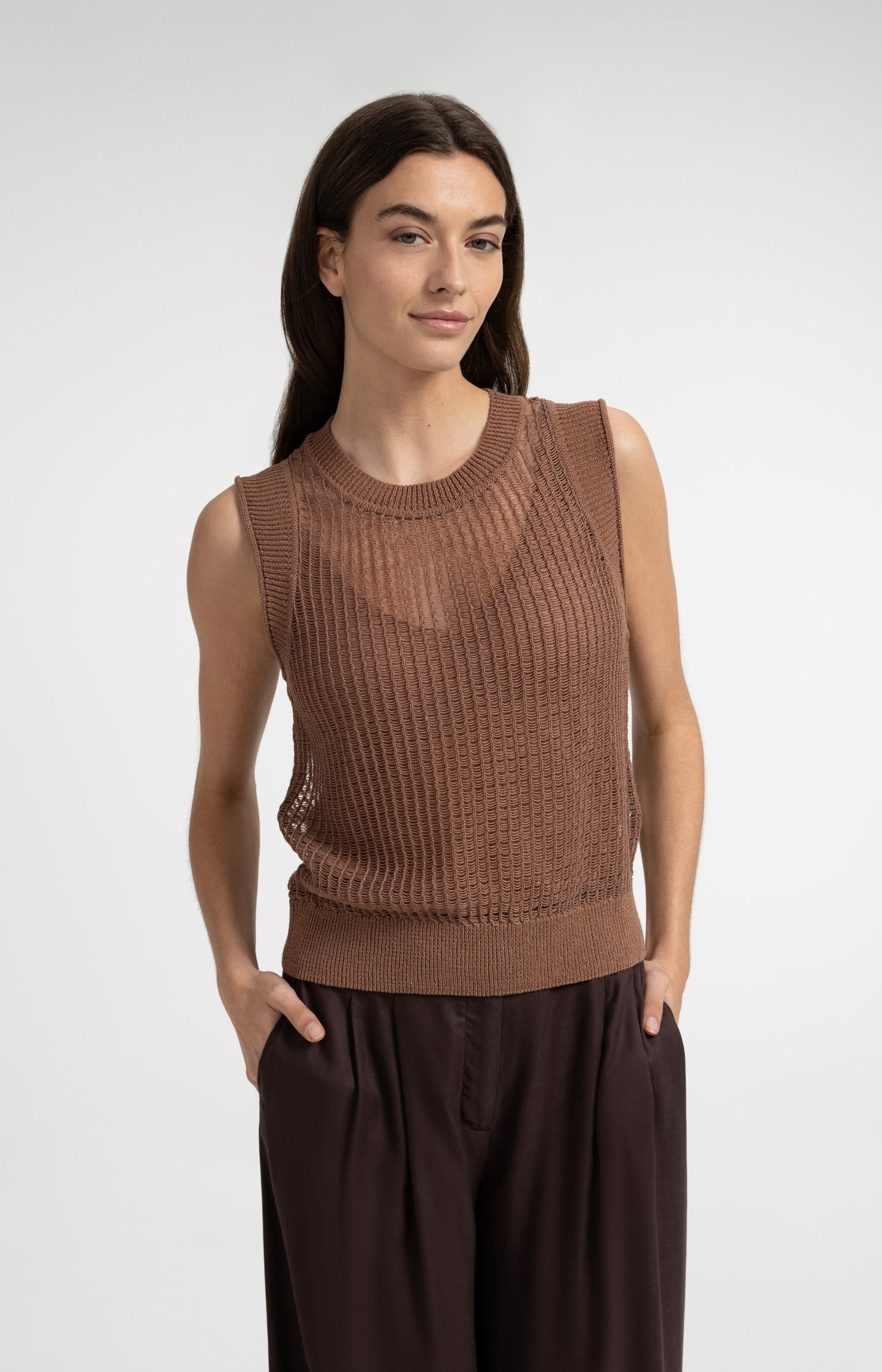 Open-knit top with matching underlayer