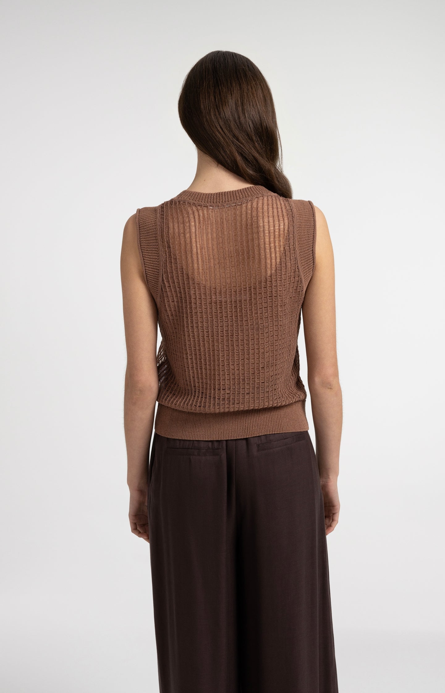 Open-knit top with matching underlayer