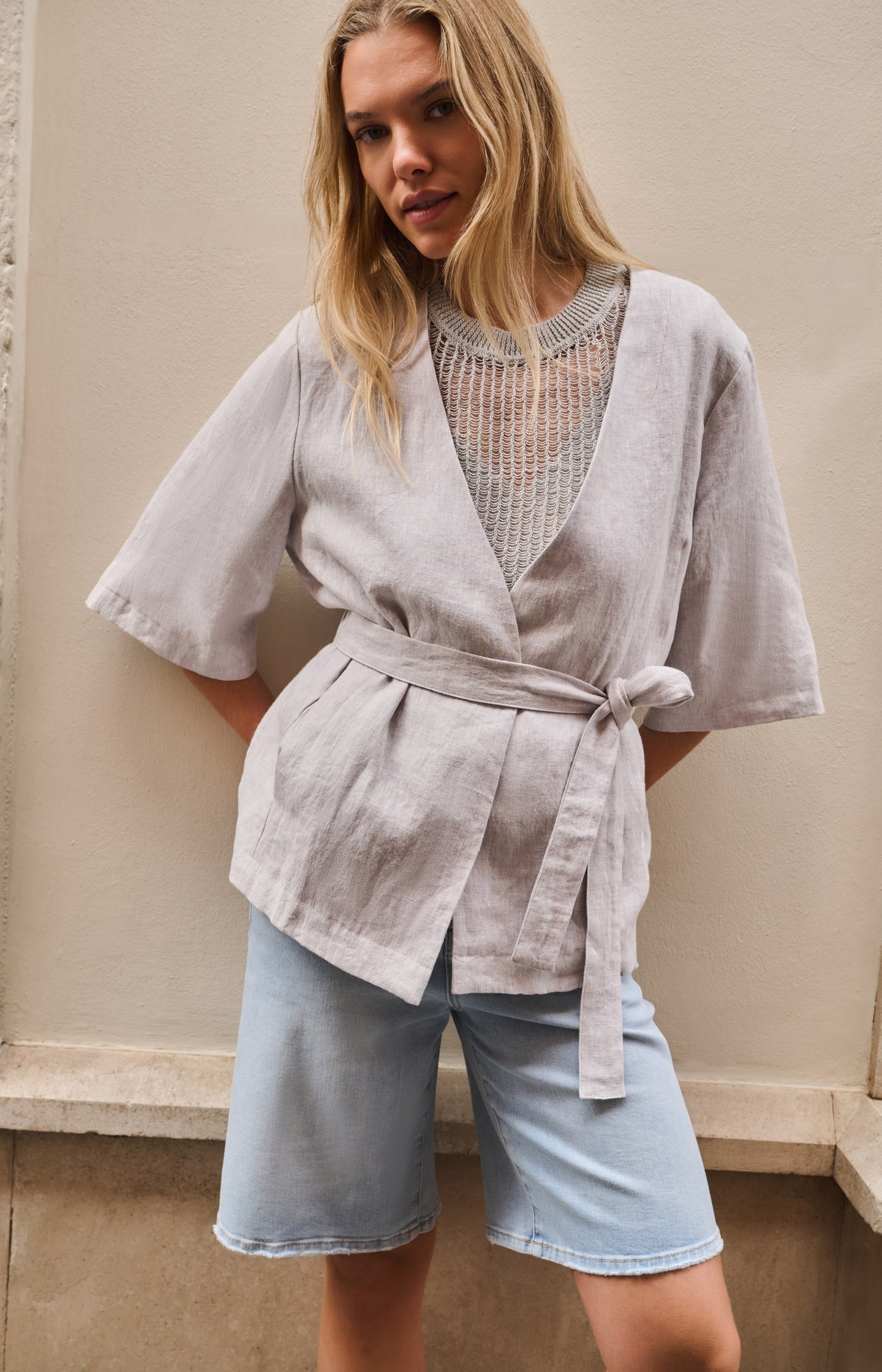 Open-knit top with matching underlayer