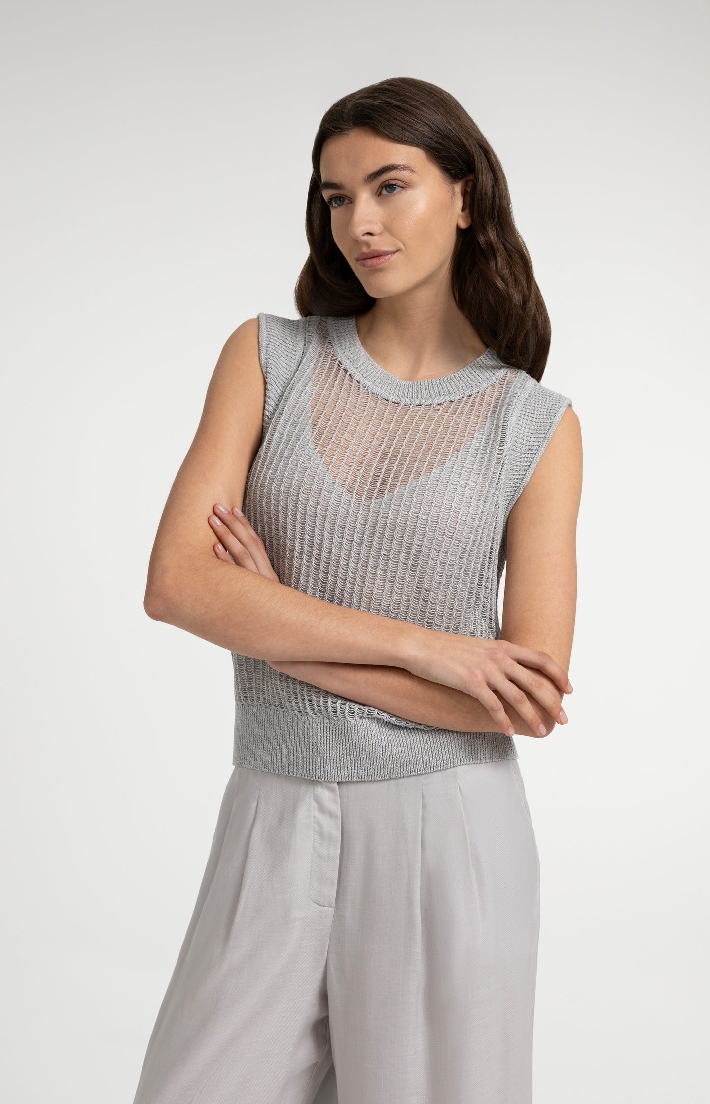 Open-knit top with matching underlayer