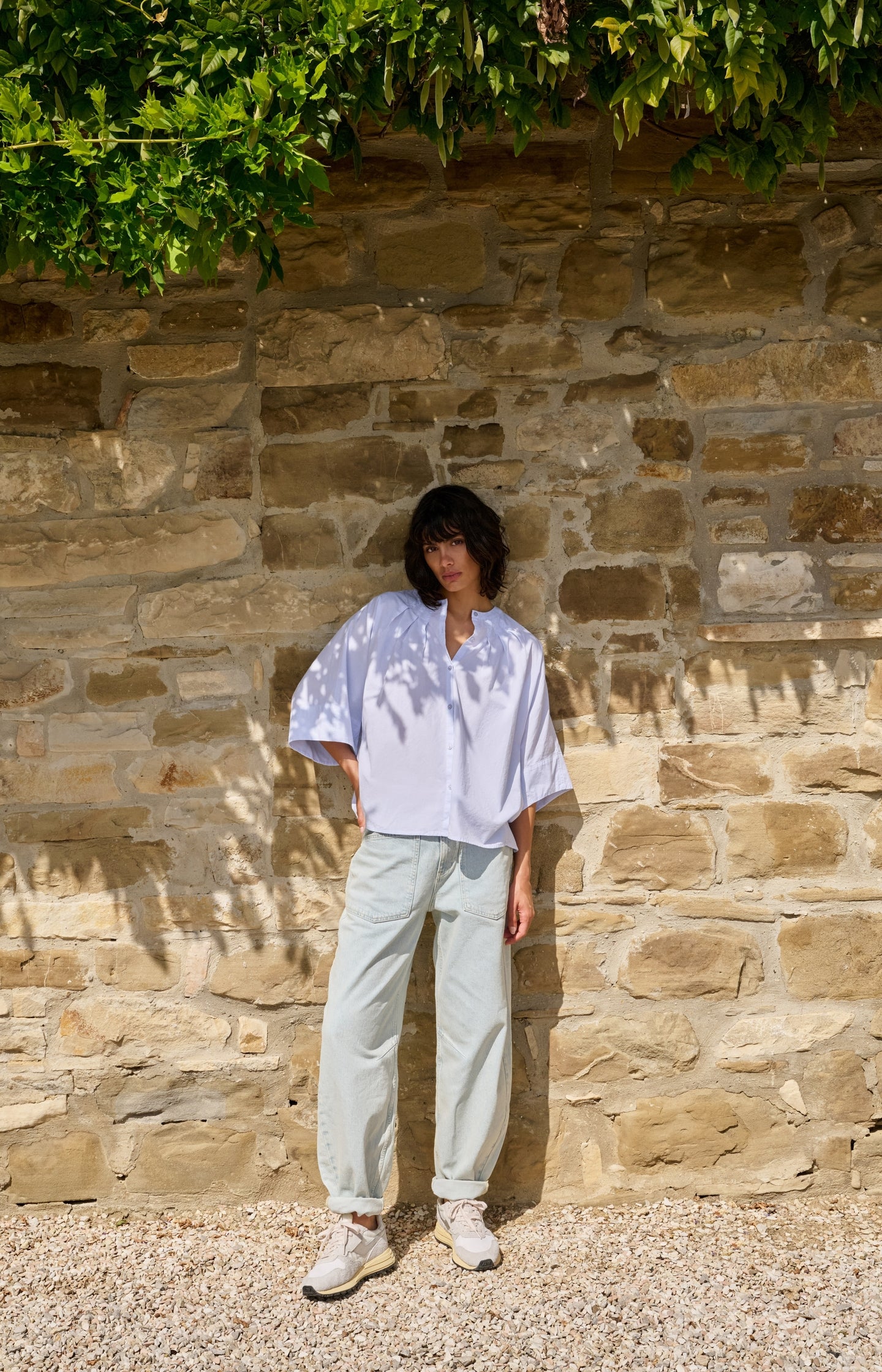 Oversized batwing blouse with pleats and wide sleeves