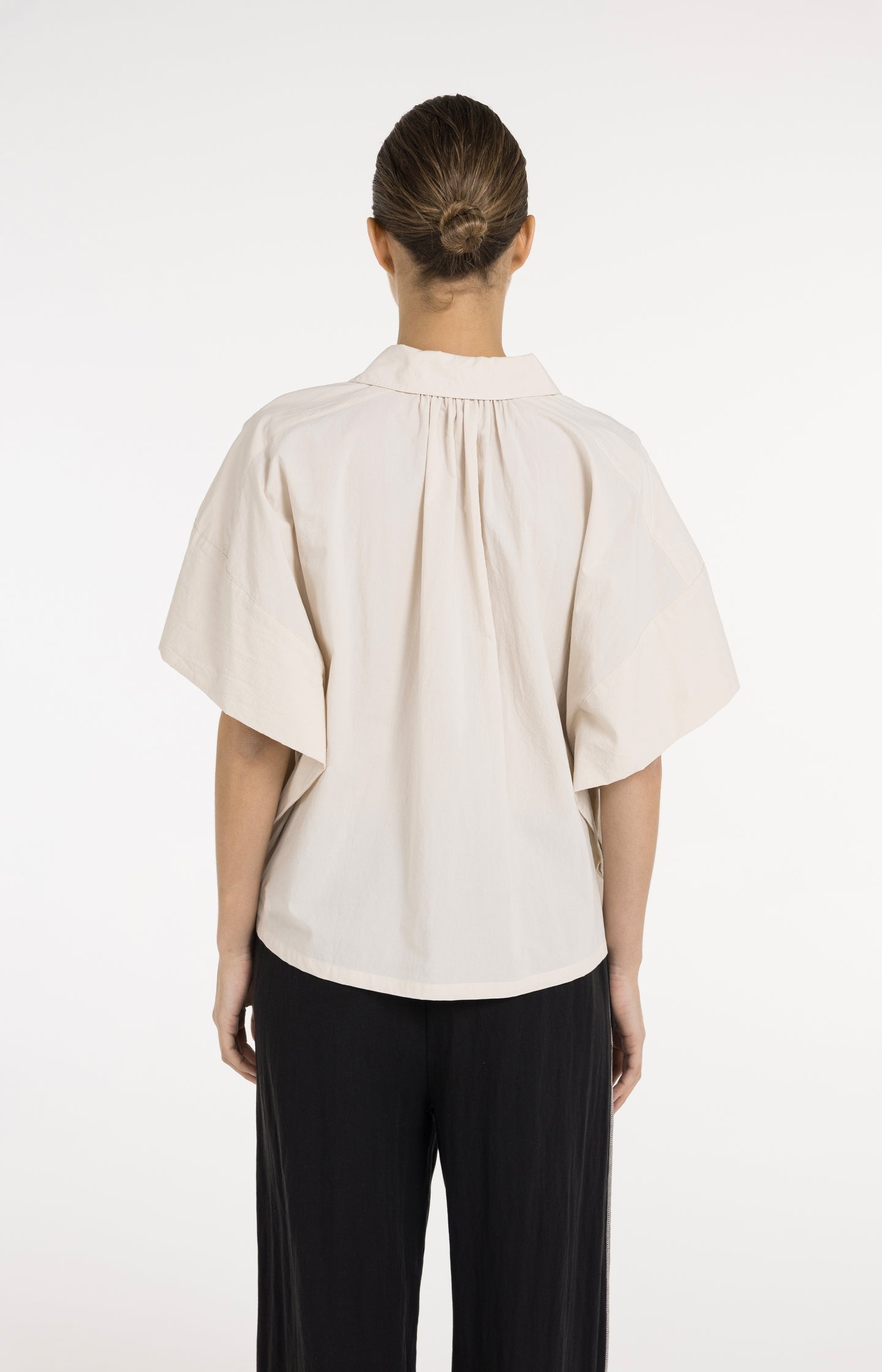 Oversized blouse with sleeve detail