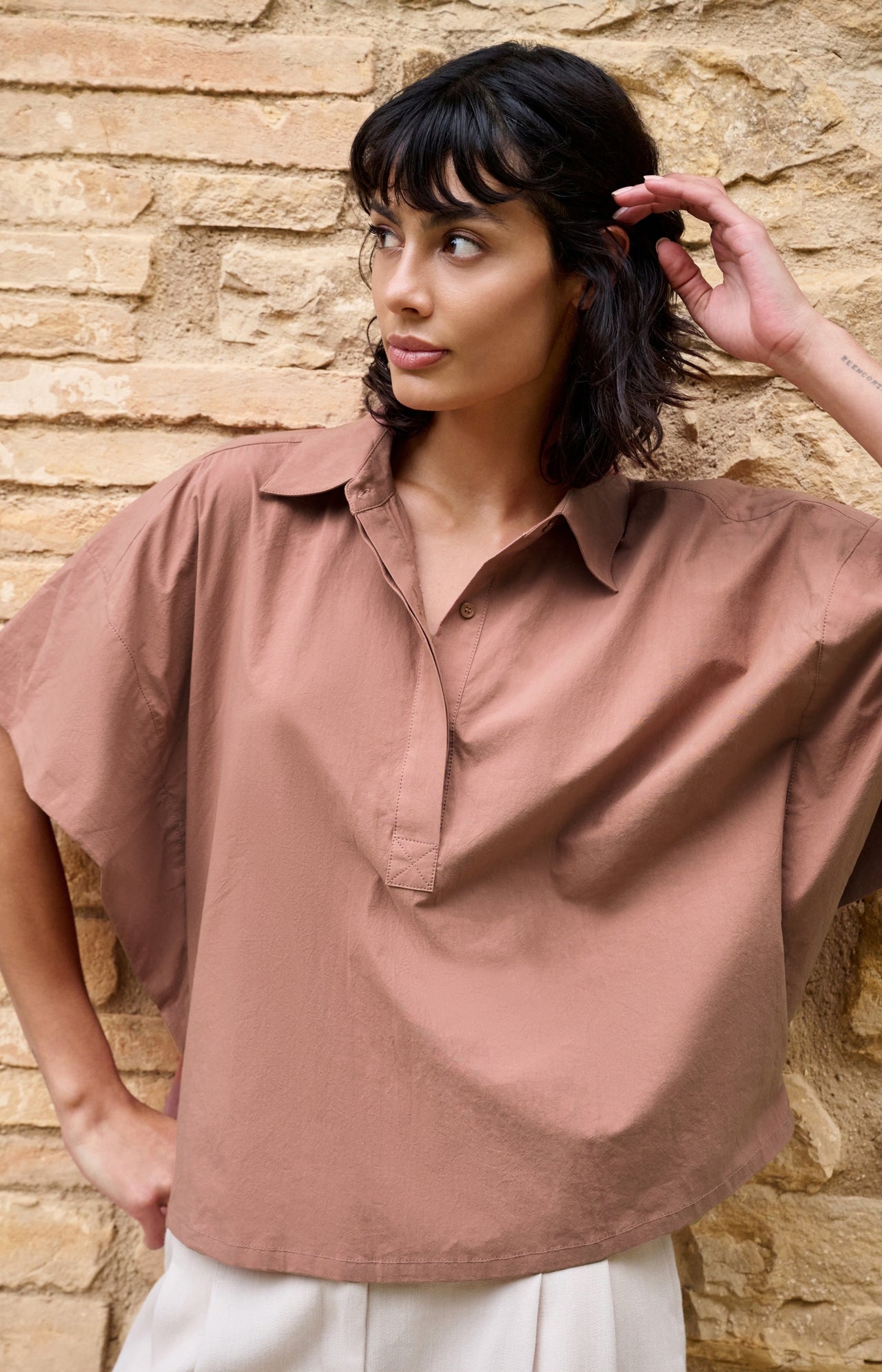 Oversized blouse with sleeve detail