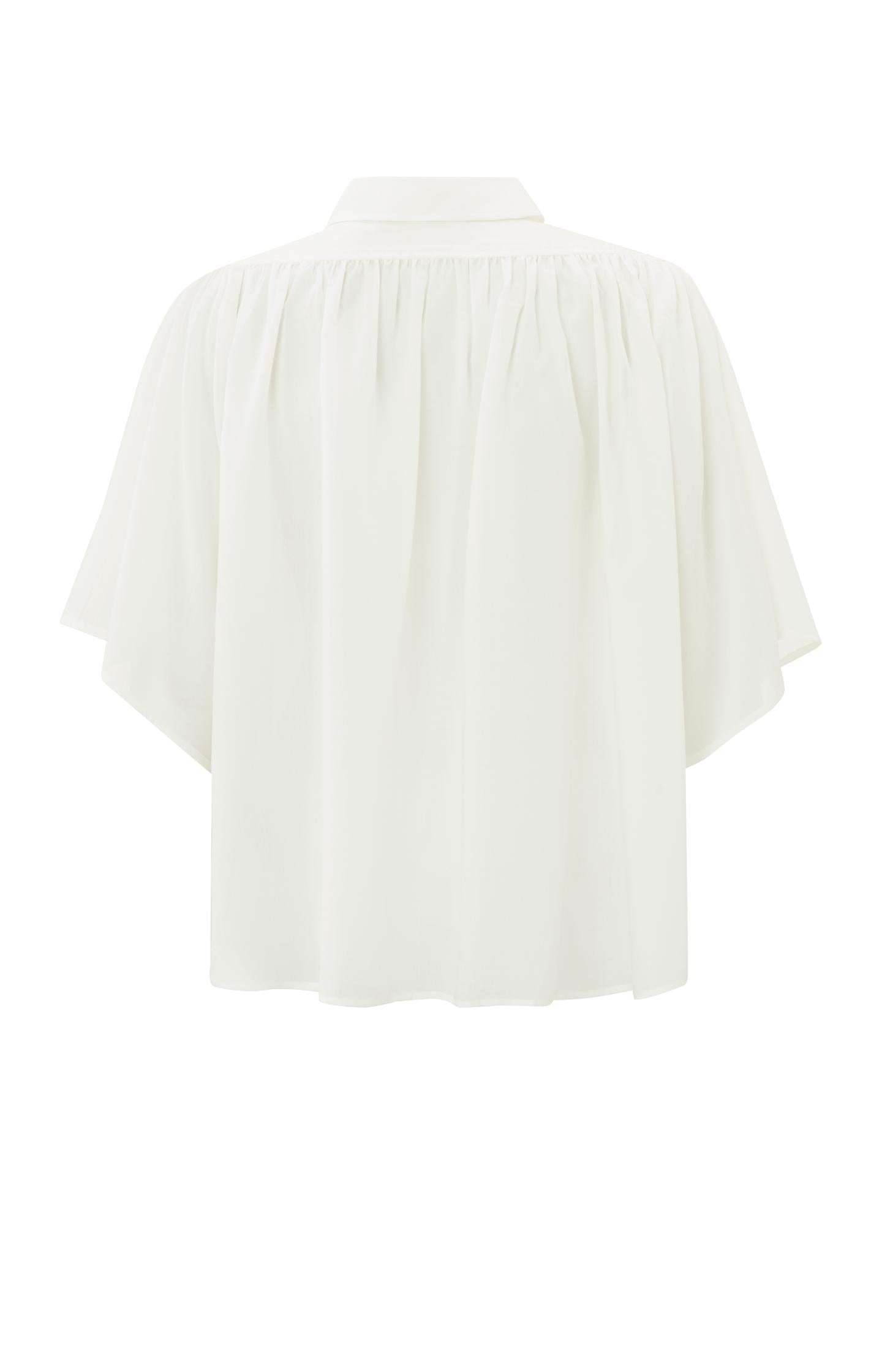 Oversized blouse with wide sleeves and pleated details