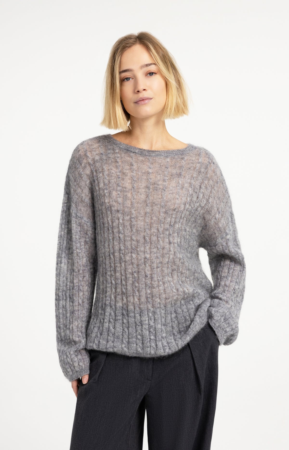 Oversized cable sweater with boat neckline