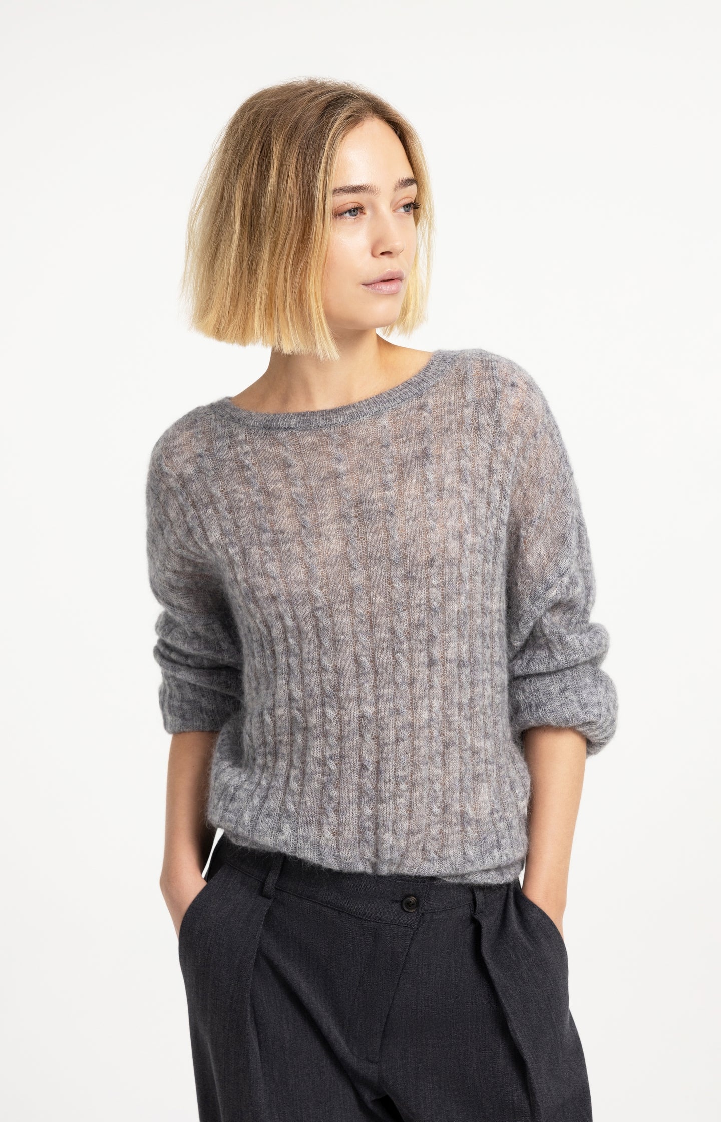 Oversized cable sweater with boat neckline
