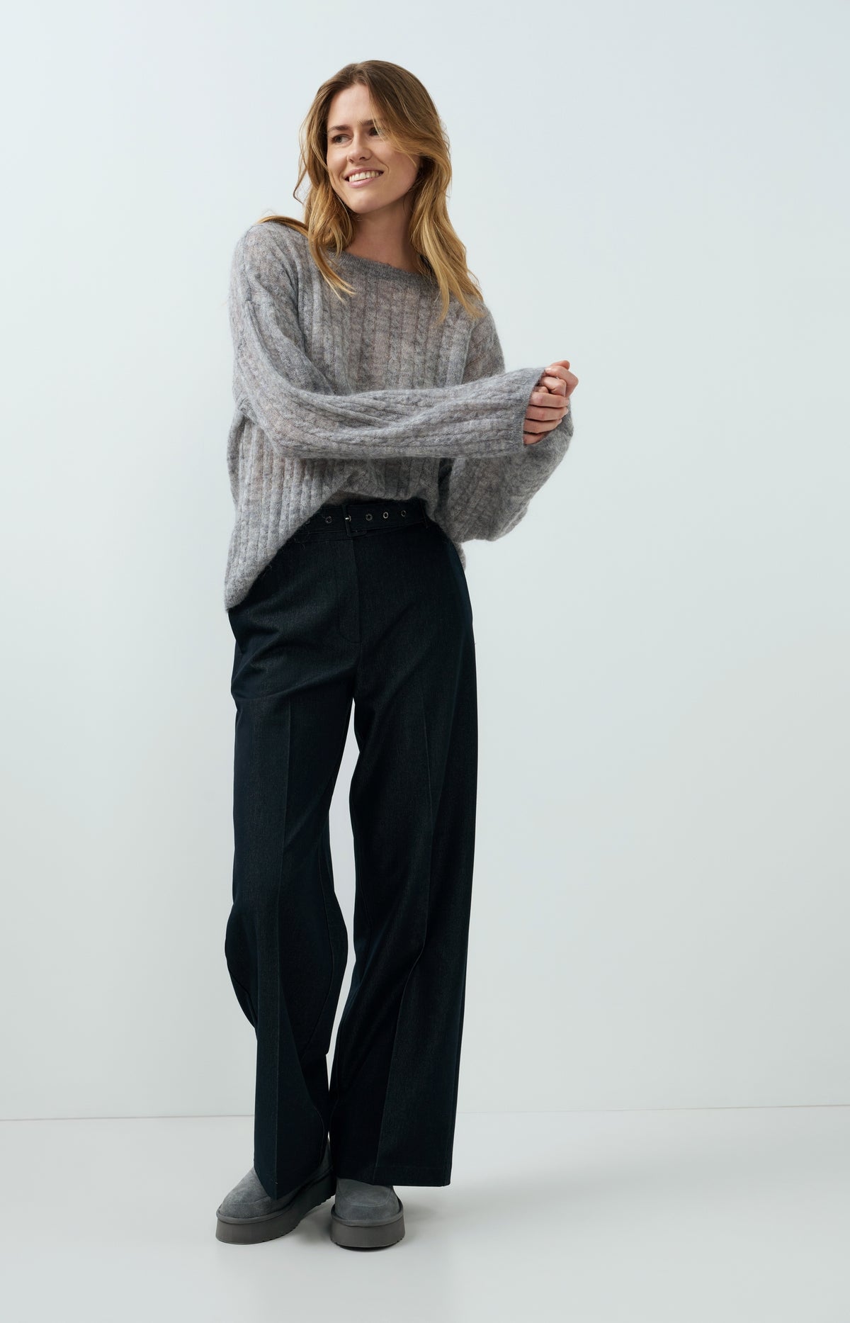 Oversized cable sweater with boat neckline