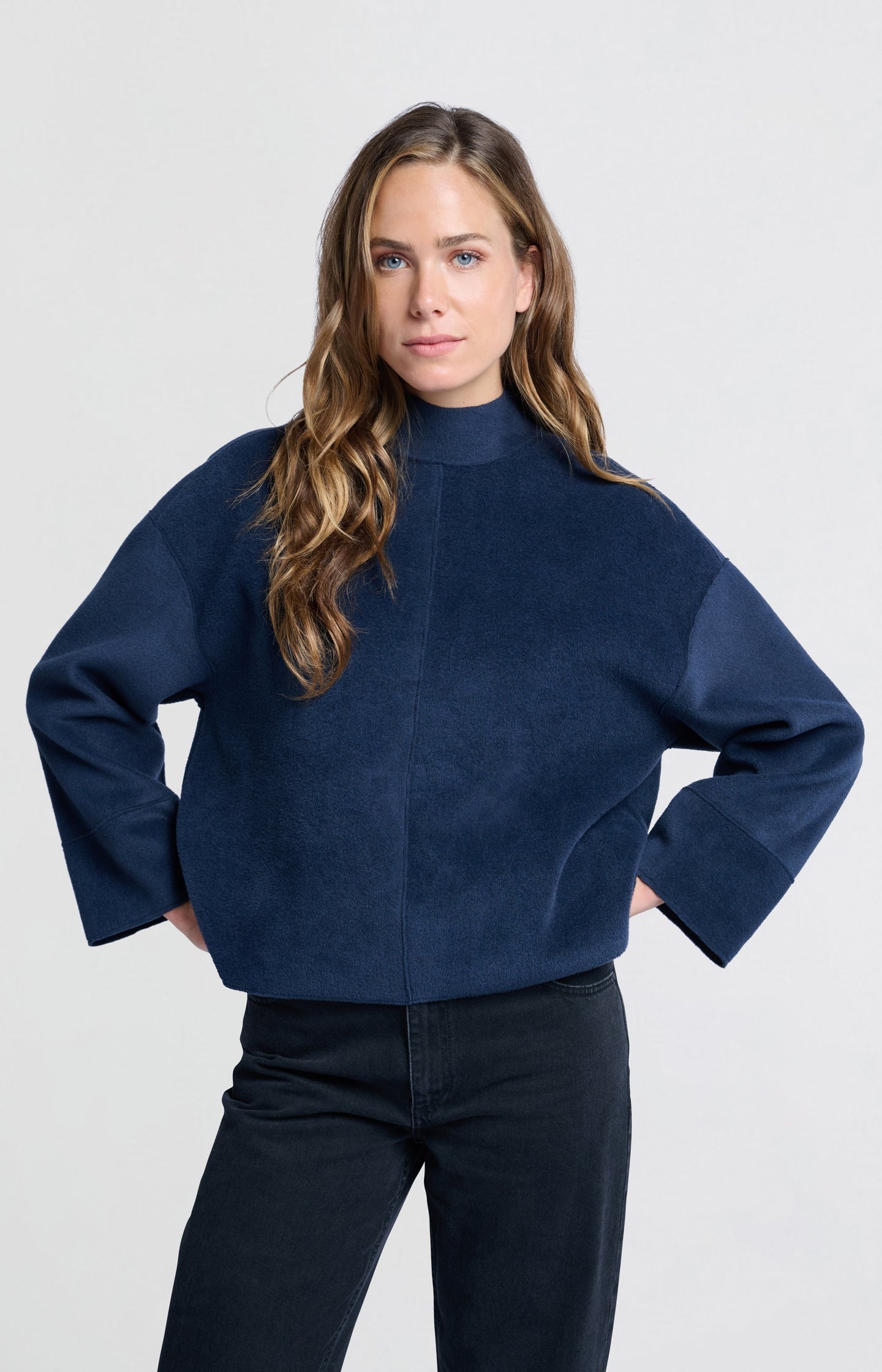 Oversized dark blue sweatshirt with high neck