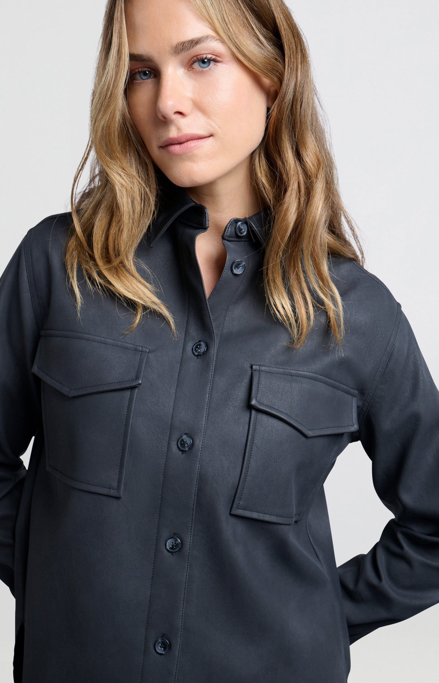 Oversized faux leather blouse with collar and long sleeves