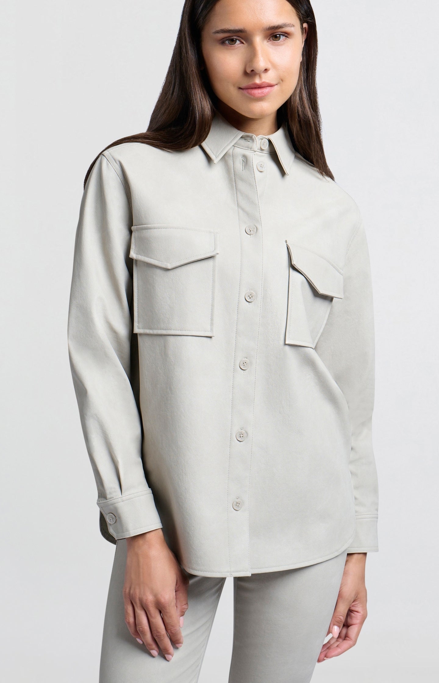 Oversized faux leather blouse with collar and long sleeves