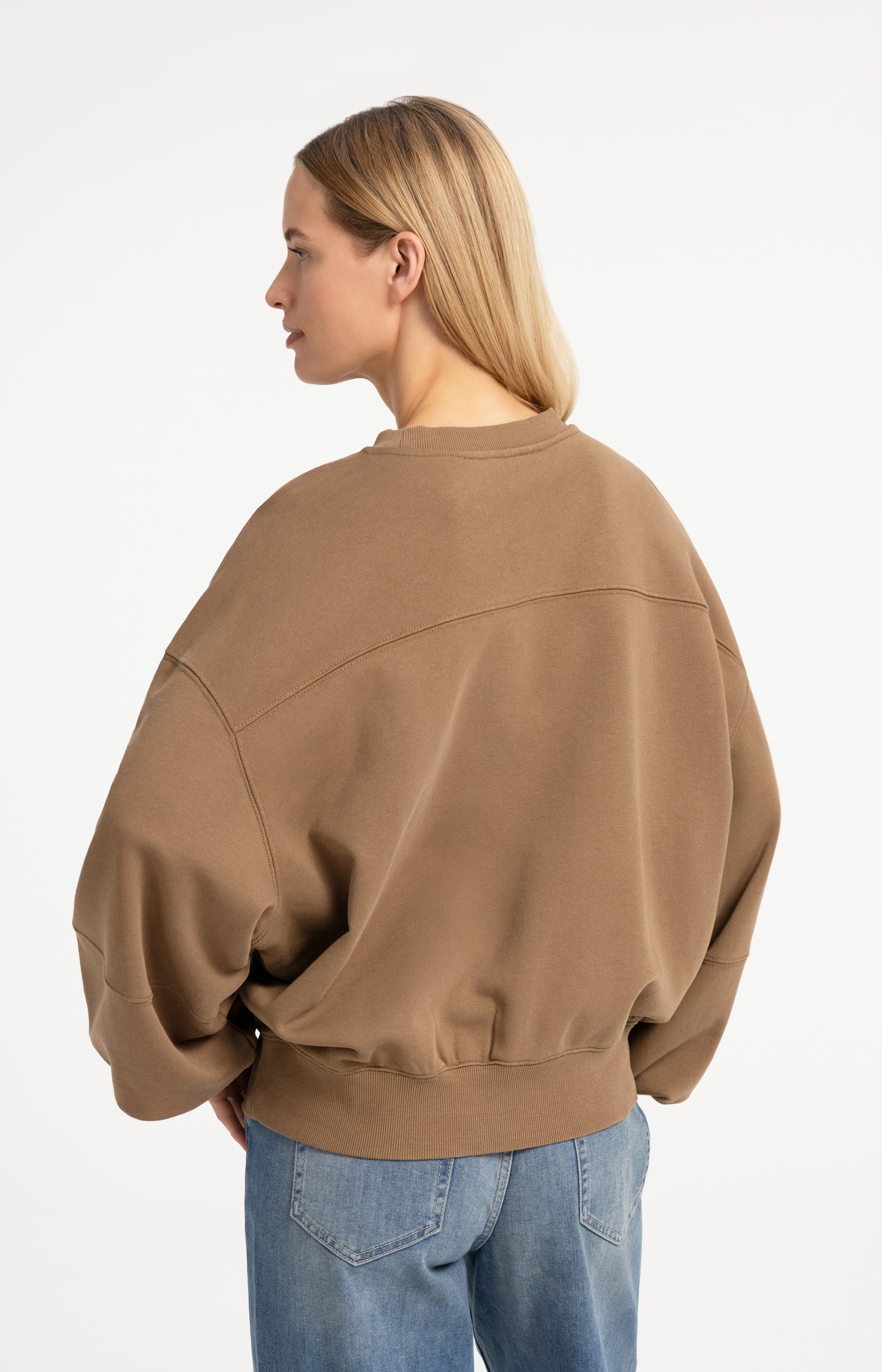 Oversized sweater with balloon sleeves and washed finish