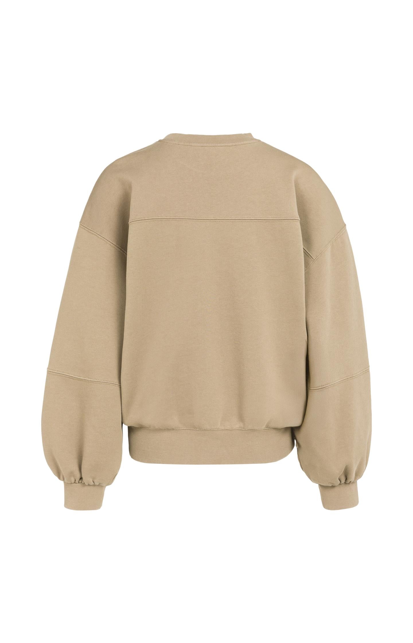 Oversized sweater with balloon sleeves and washed finish