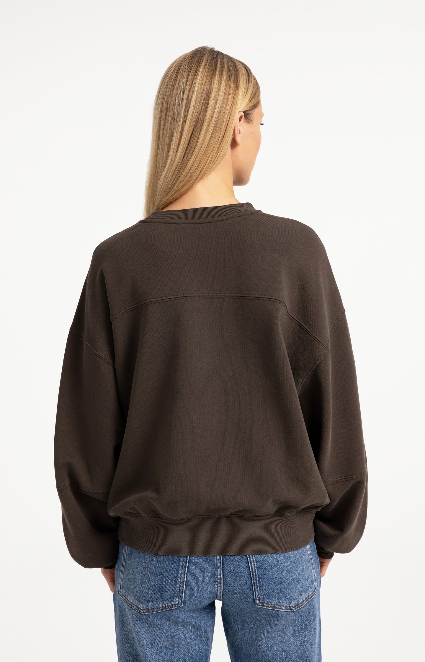 Oversized sweater with balloon sleeves and washed finish