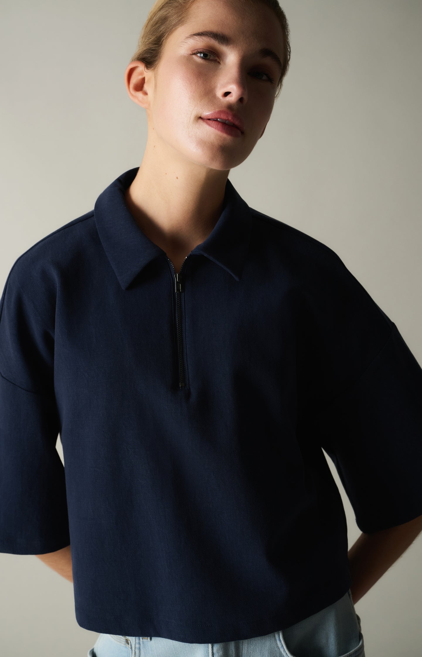Polo top with half zip and short wide sleeves