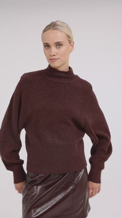 Knitted turtleneck sweater with batwing sleeves - Type: video