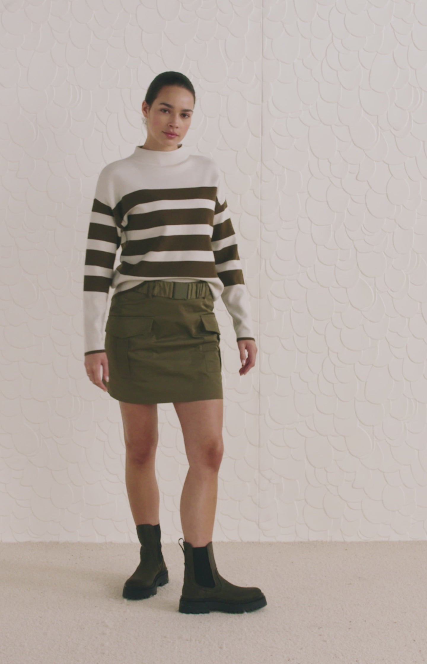 Mini skirt with cargo belt, cargo pockets and a zip