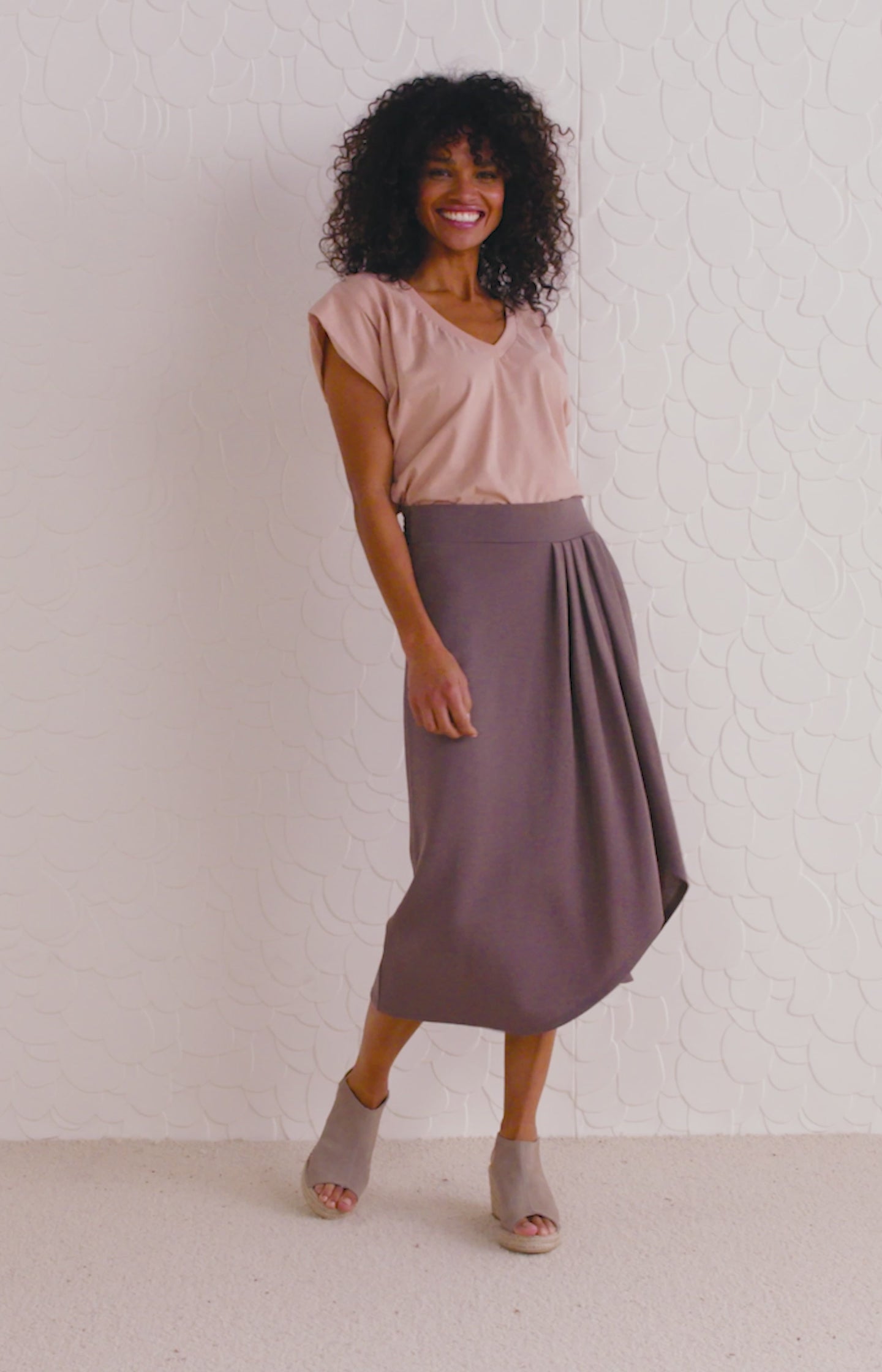 Jersey skirt with elastic waist and draped effect