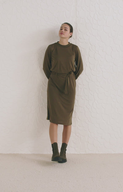 Jersey dress with high neck, long puff sleeves and cord