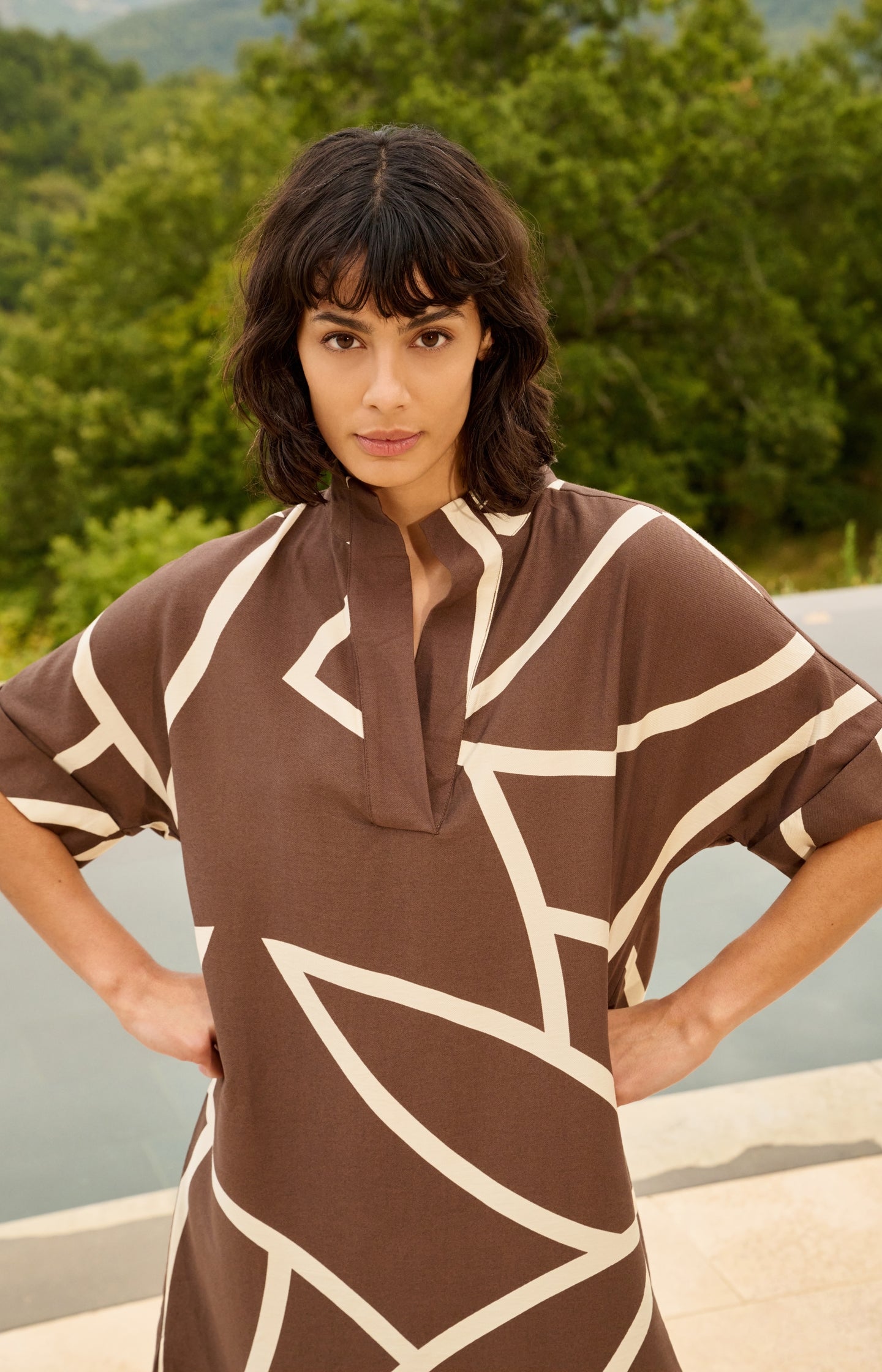 Printed dress with short sleeves and polo collar