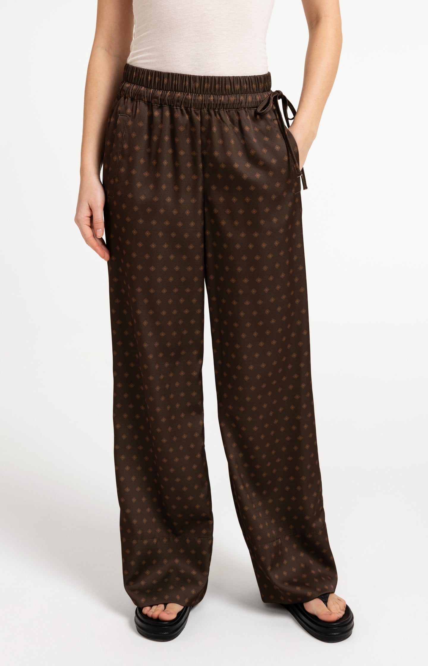 Printed trousers with wide legs and elastic waist