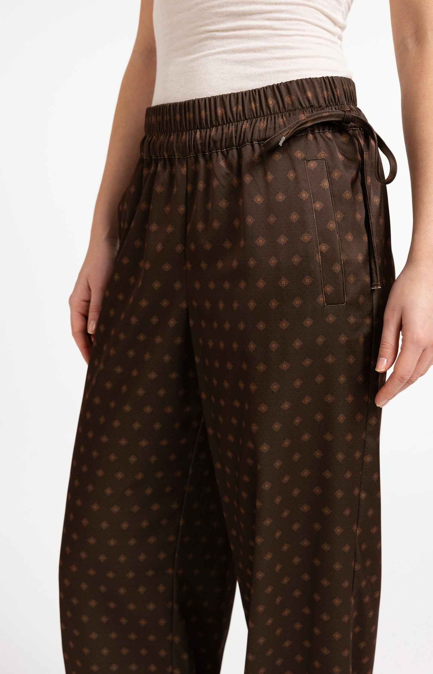 Printed trousers with wide legs and elastic waist