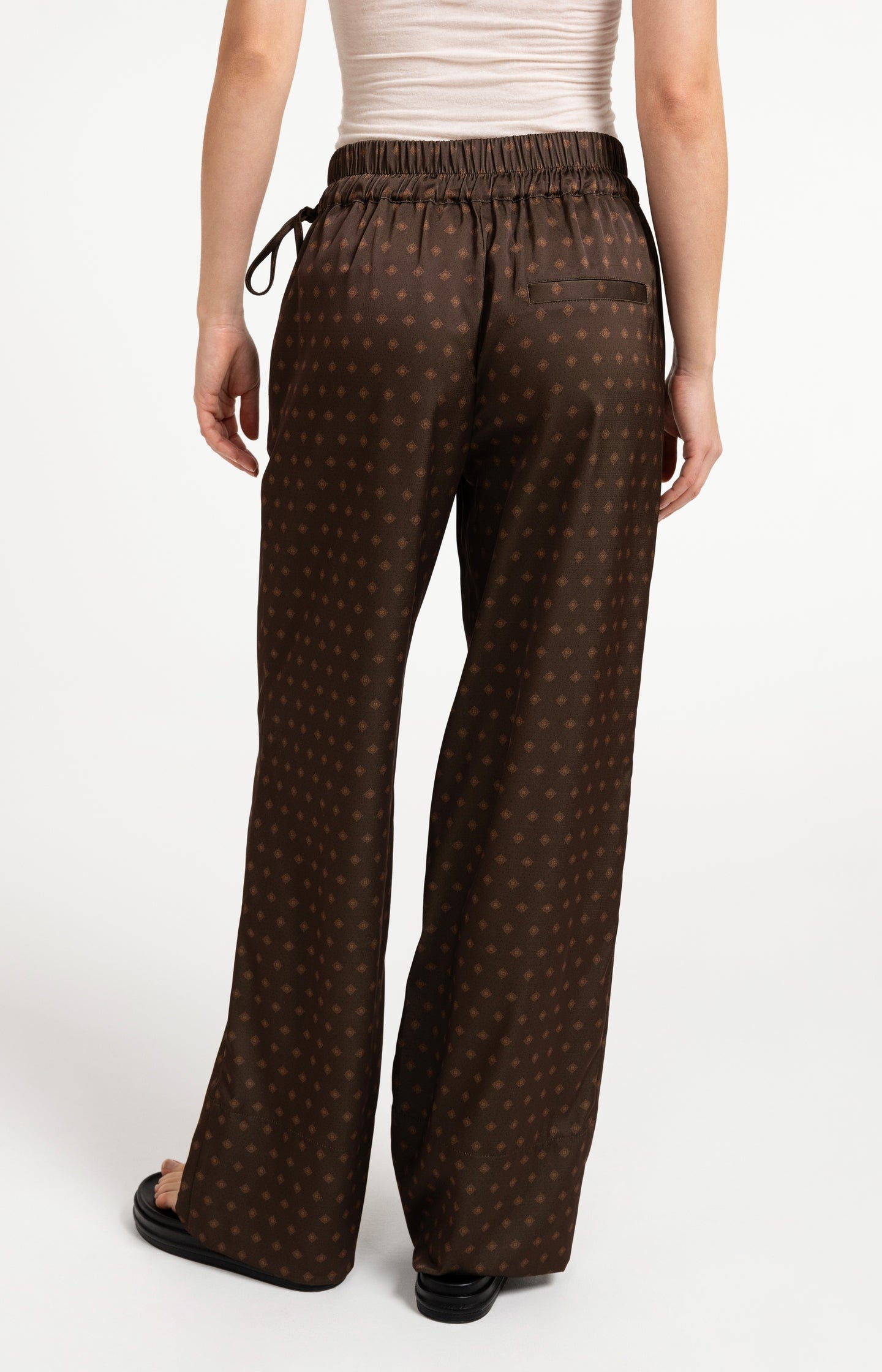 Printed trousers with wide legs and elastic waist
