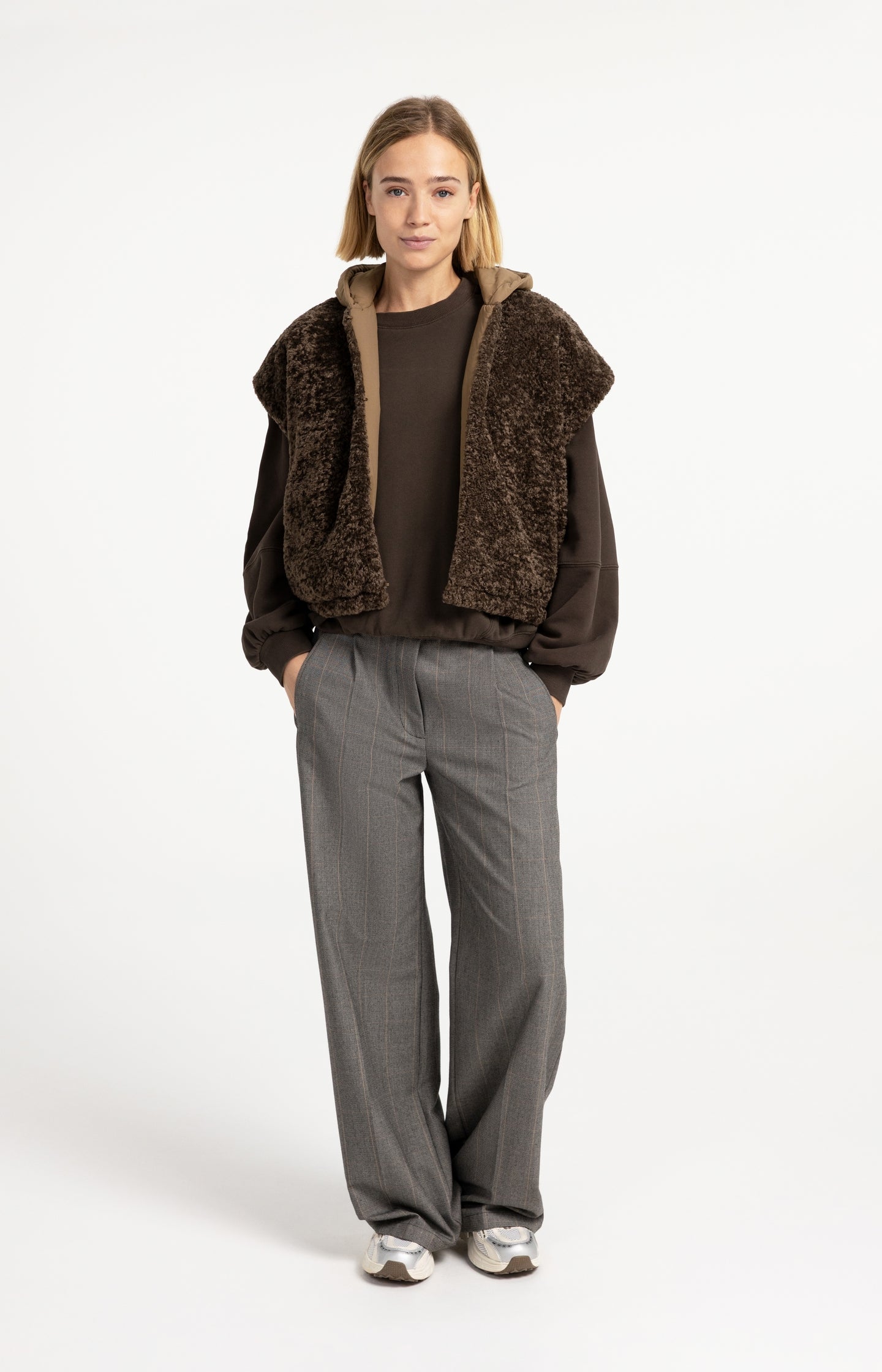 Reversible bodywarmer with hood