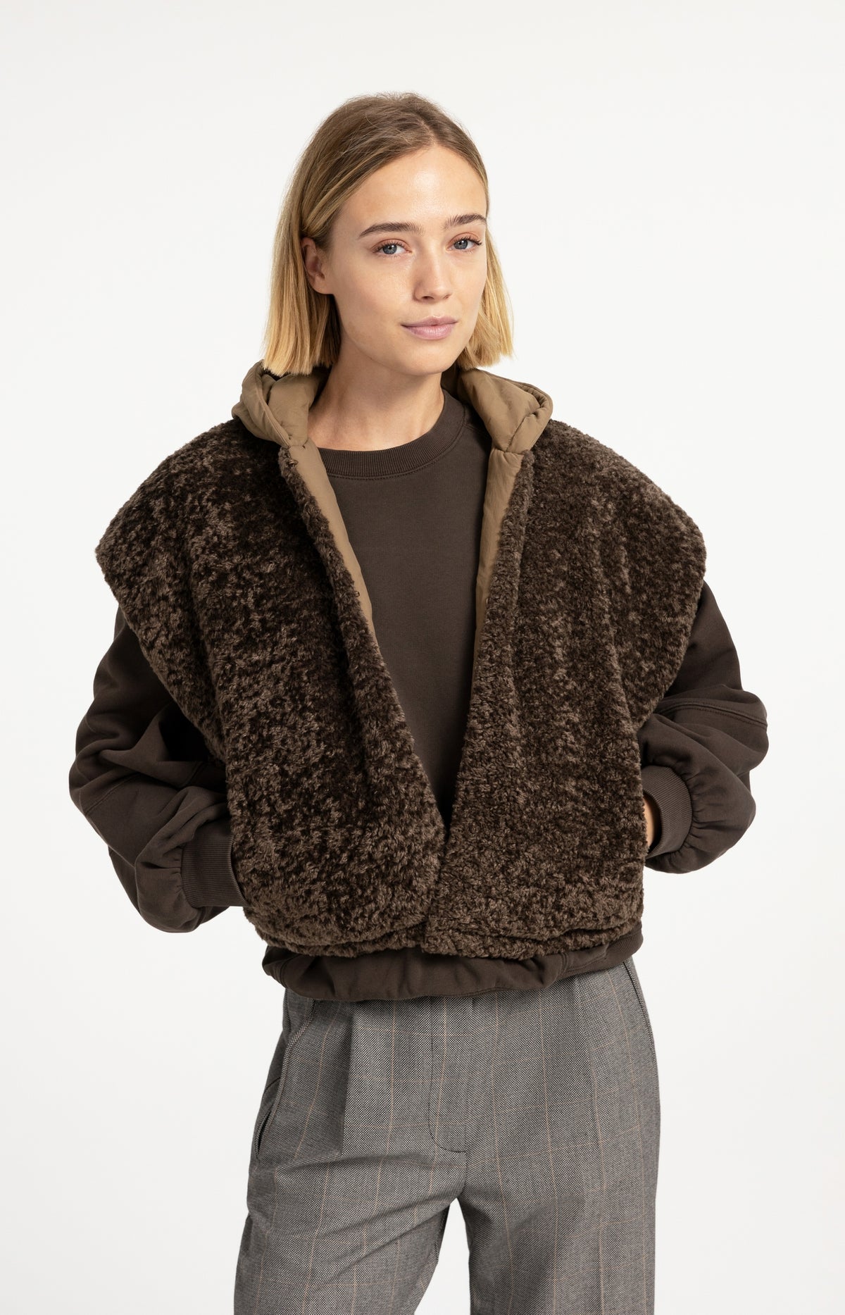 Reversible bodywarmer with hood