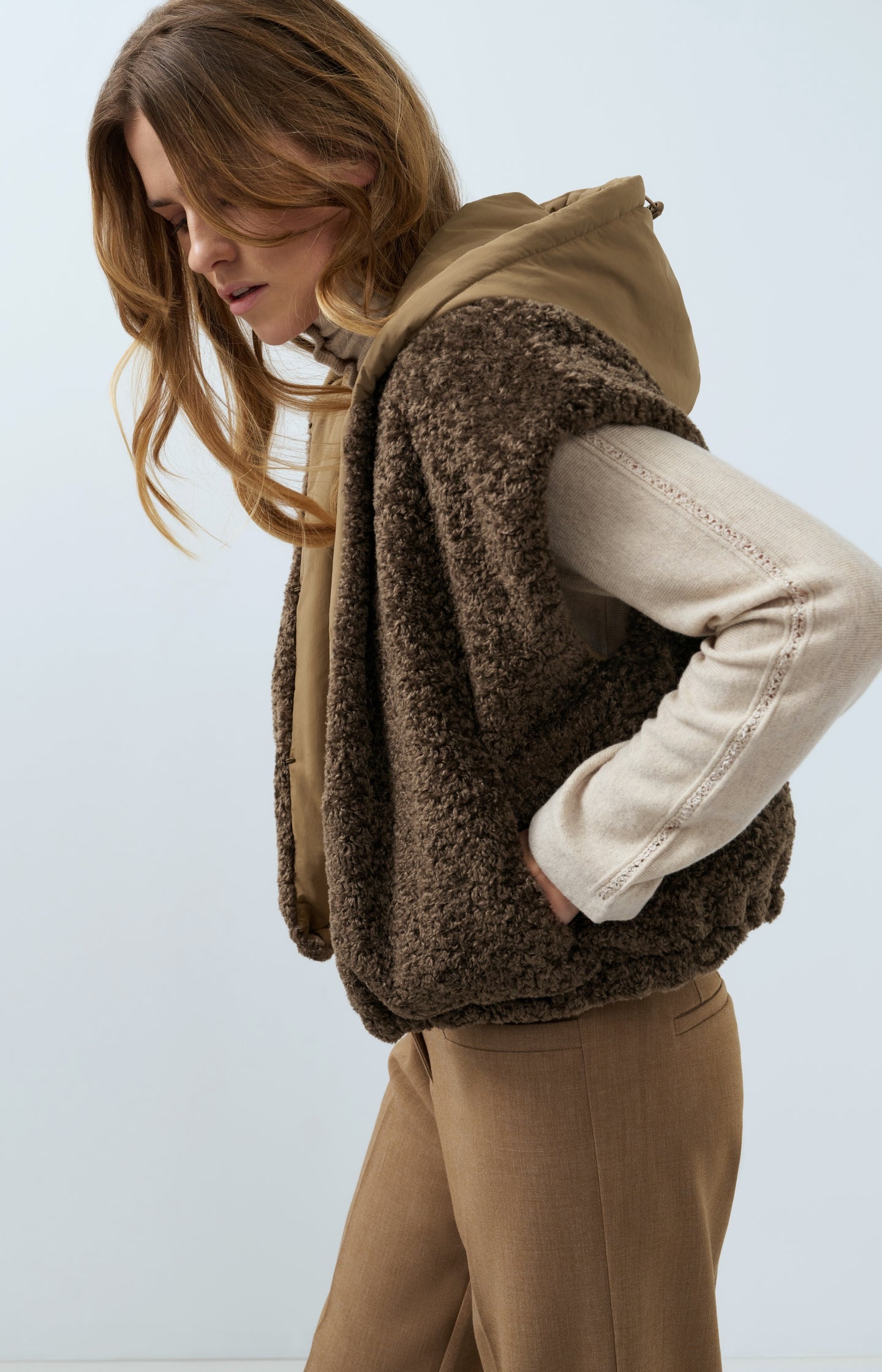 Reversible bodywarmer with hood