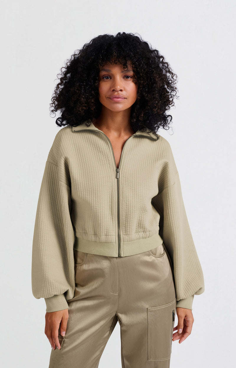 Ribbed jersey cardigan with zipper closure and cords